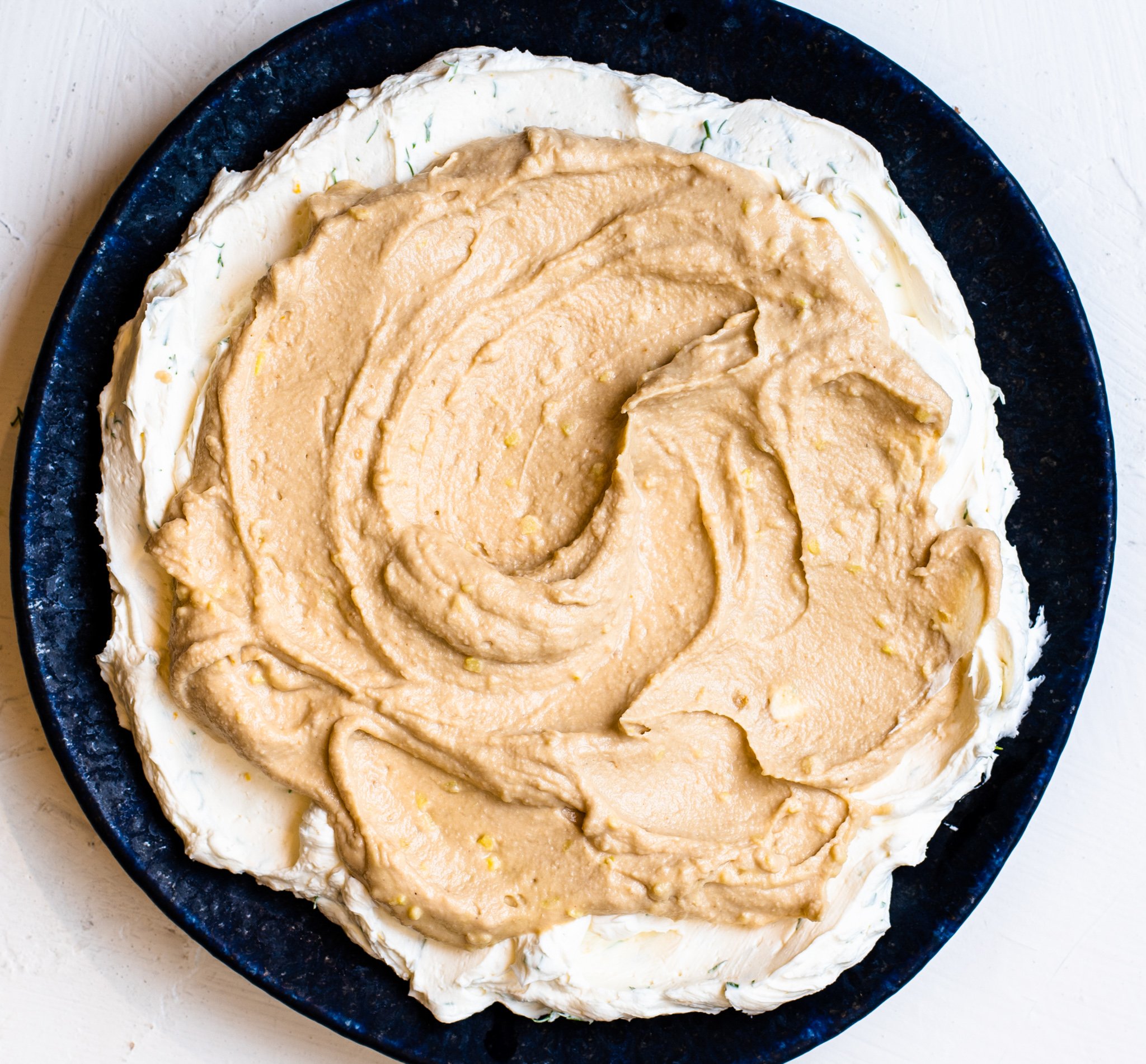 Layered Greek Dip with hummus.