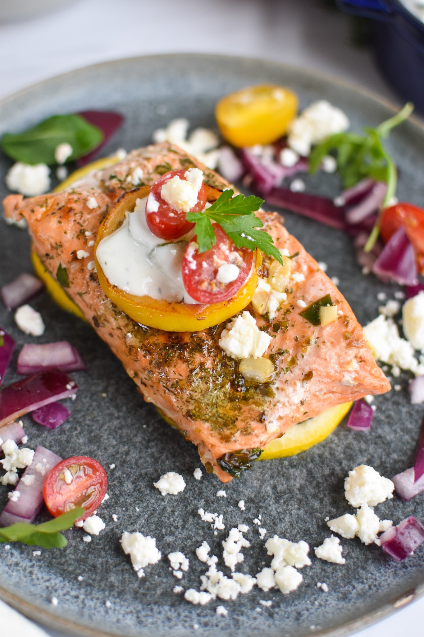 Pan Seared Greek Salmon with lemon slice.