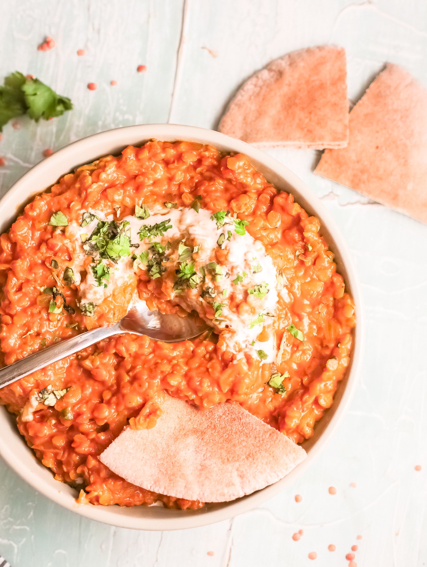 Red Lentil Curry with spoon.