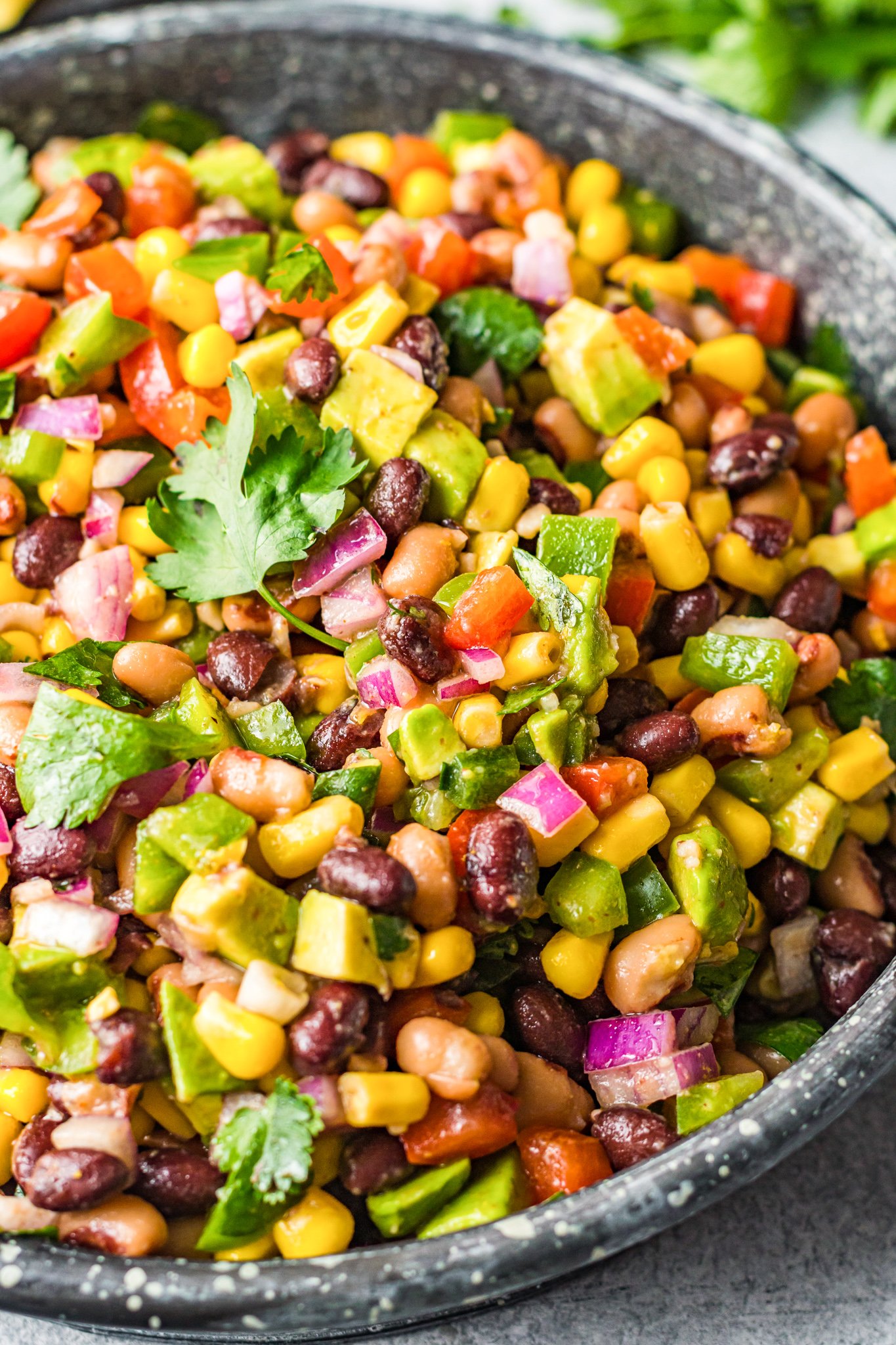 Cowboy Caviar Recipe in a bowl with cilantro. 