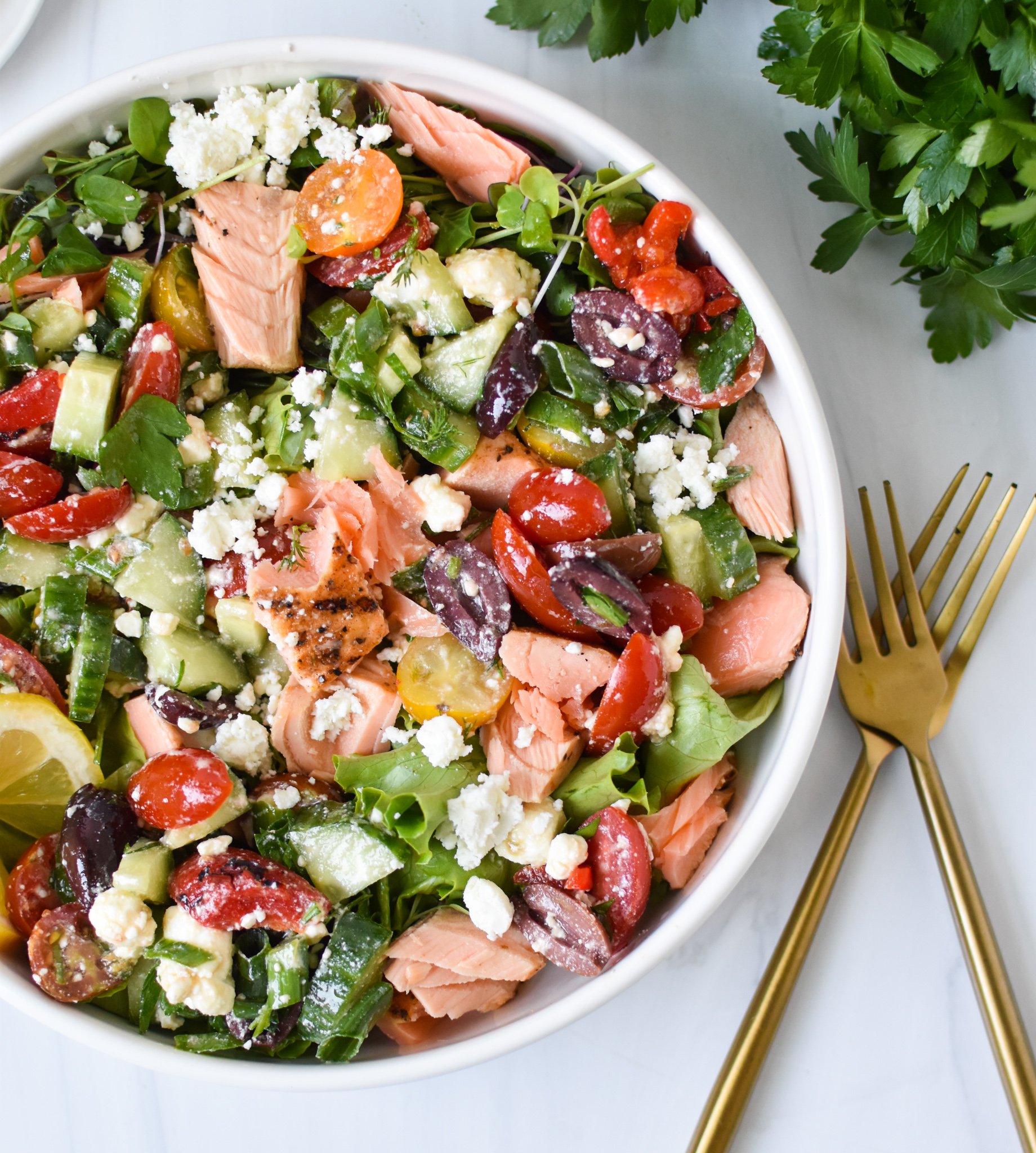 Mediterranean Salmon Bowl with forks. 