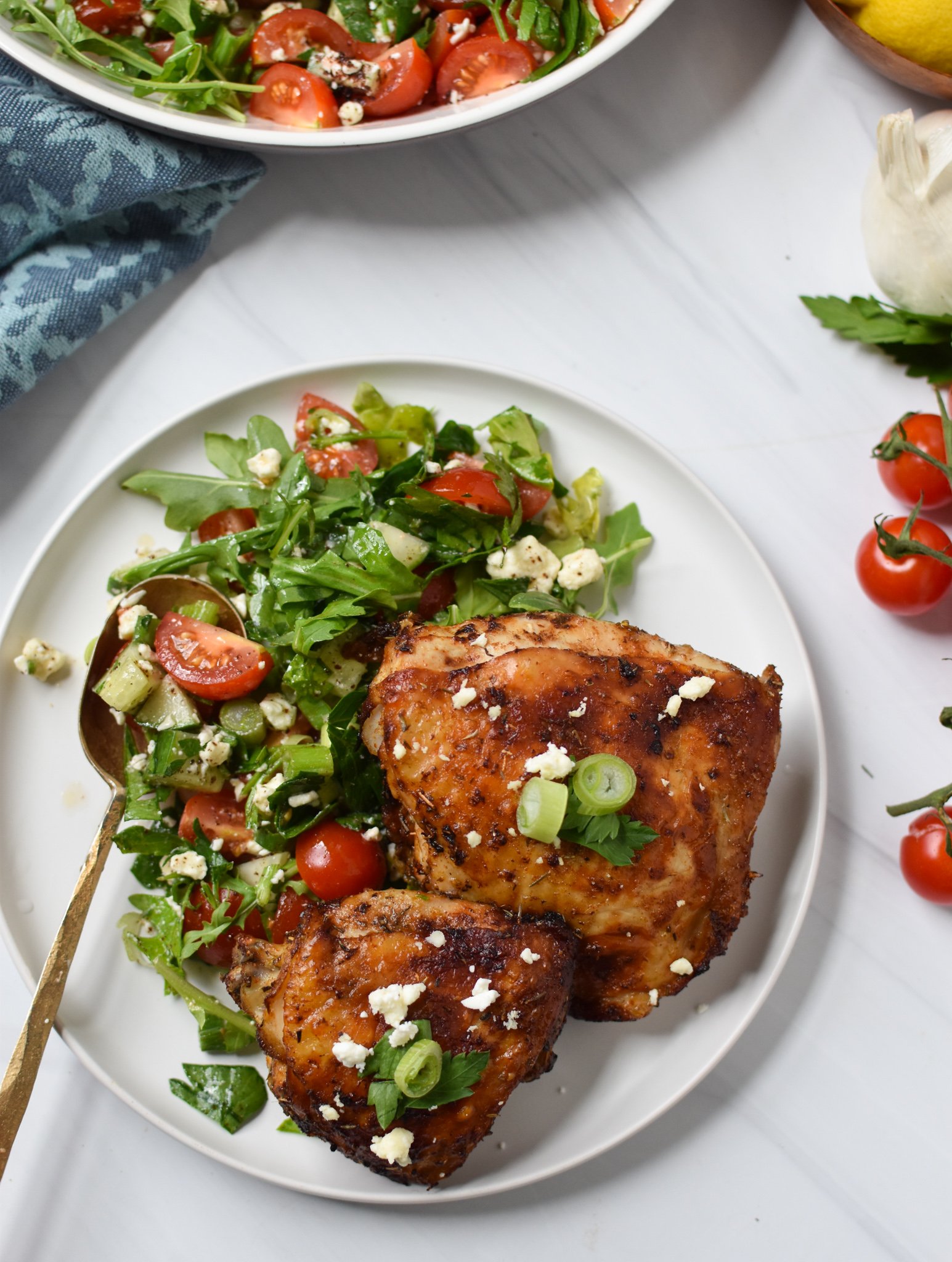 Air Fryer Mediterranean Chicken Thighs with spoon.