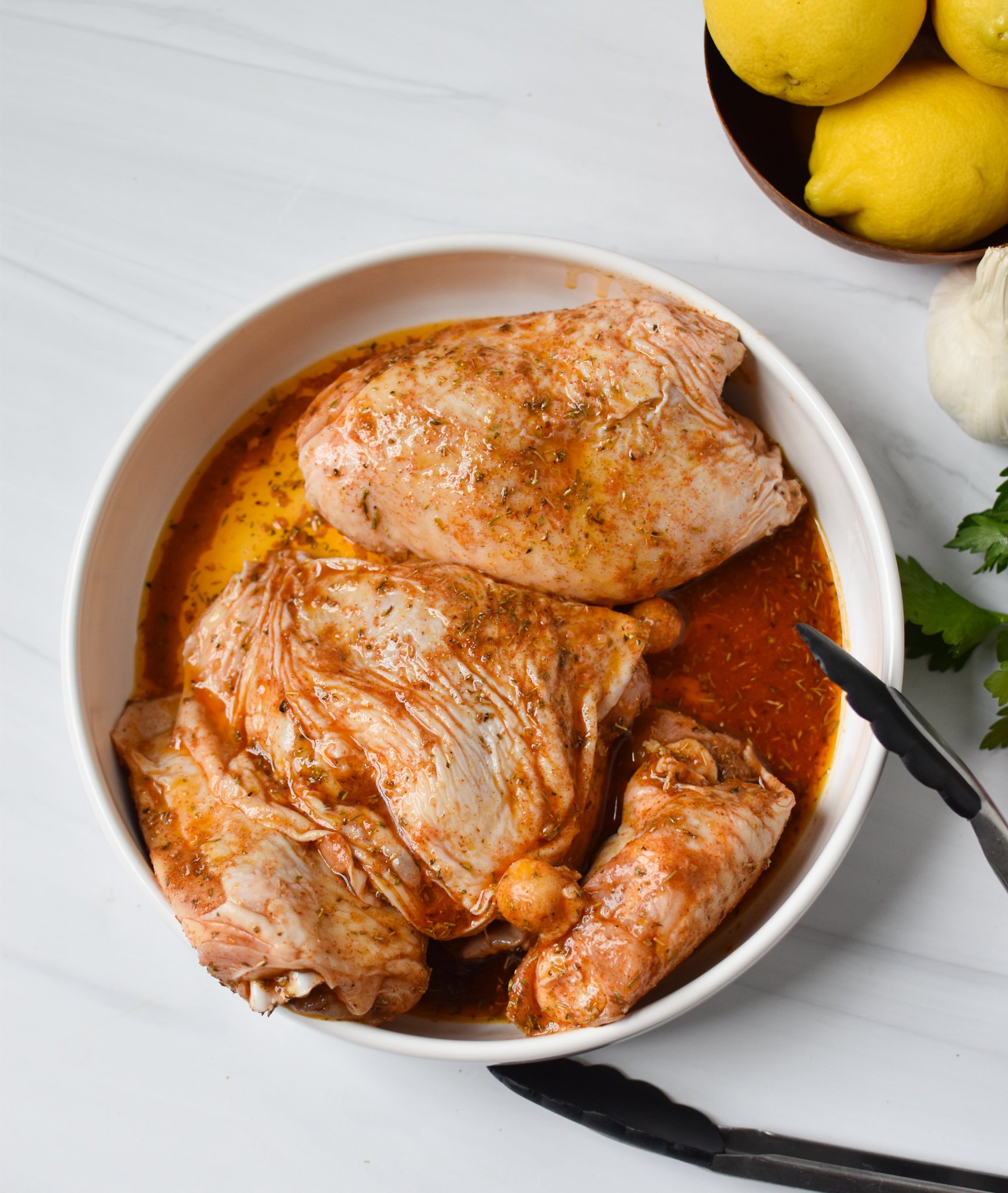 Air Fryer Mediterranean Chicken Thighs in a bowl. 