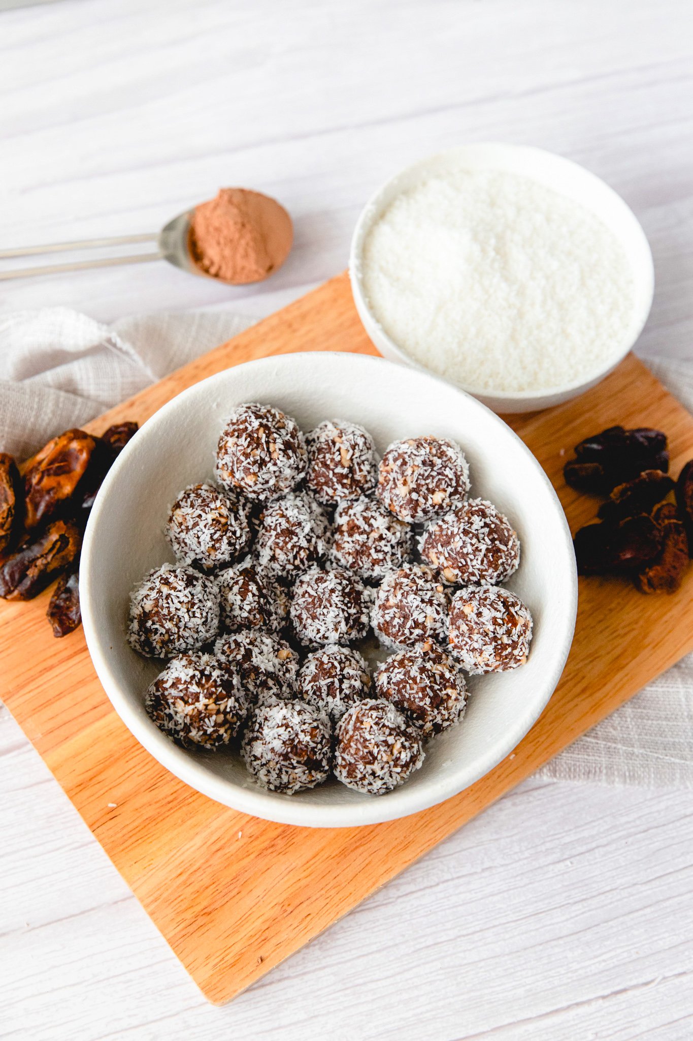 Easy Date Protein Balls with coconut in bowl. 