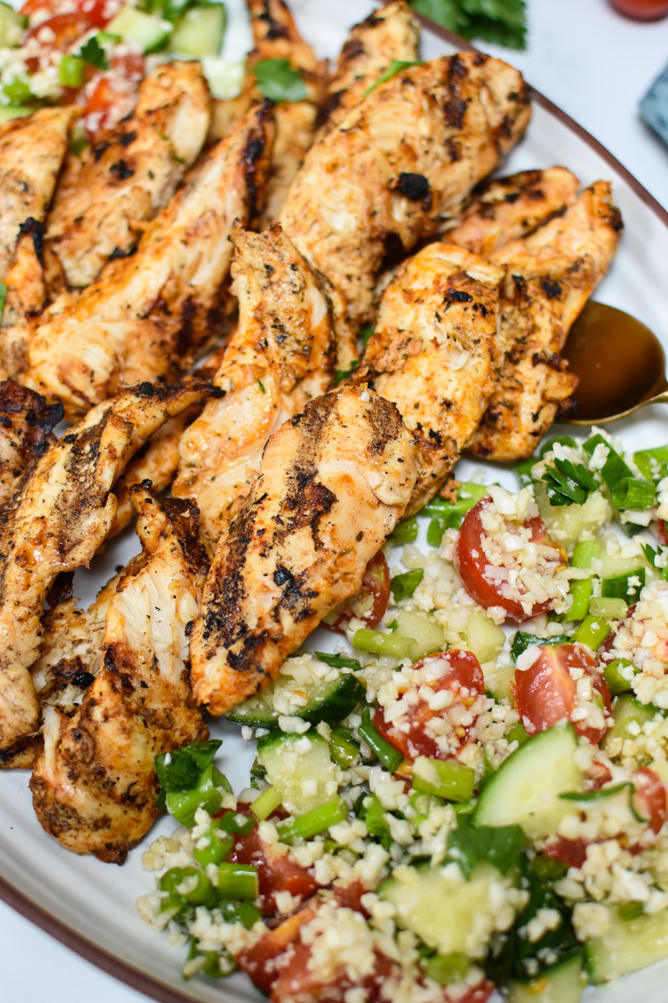 Yogurt Marinated Chicken with a salad. 