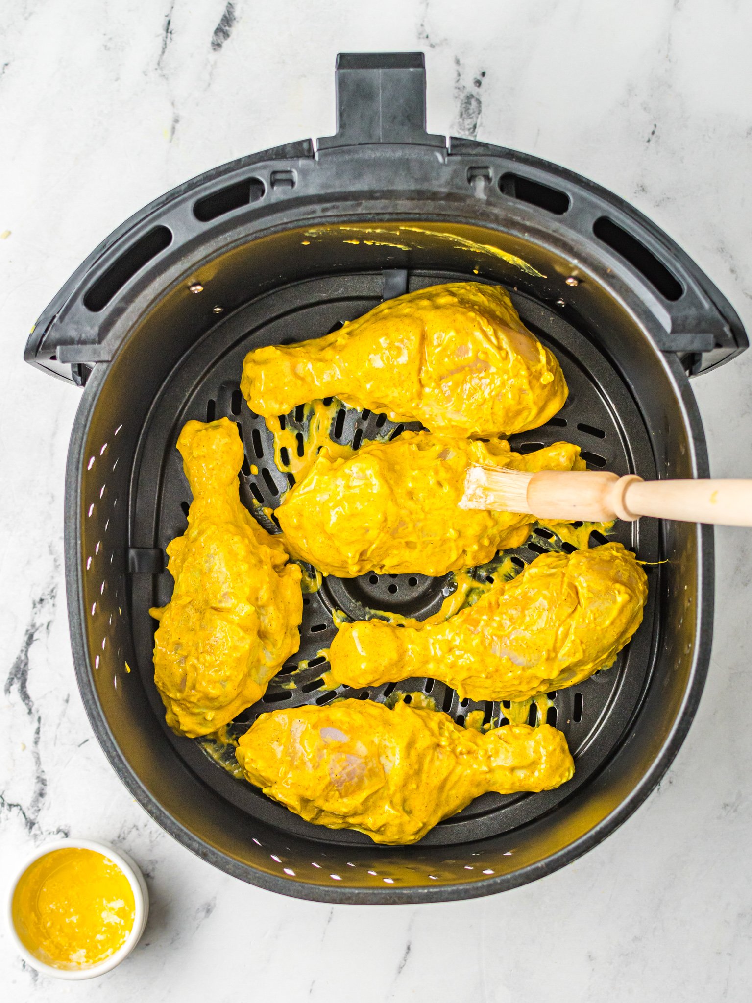 Air Fryer Tandoori Chicken Legs with marinade. 
