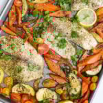 Mediterranean Baked Tilapia on a sheet pan.