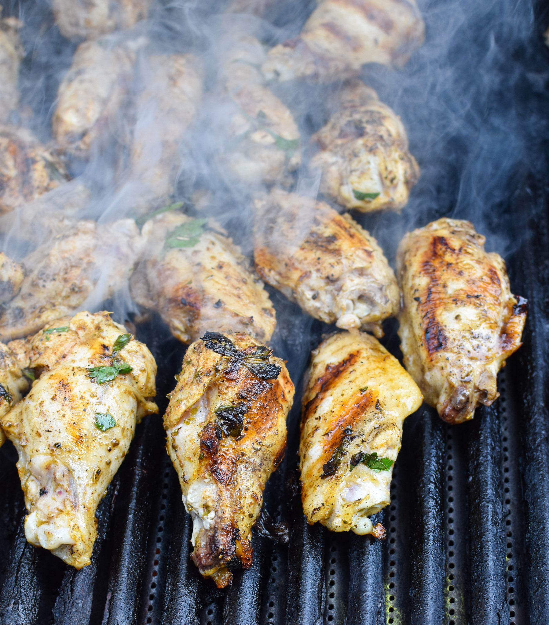 Mediterranean Chicken Wings on grill. 