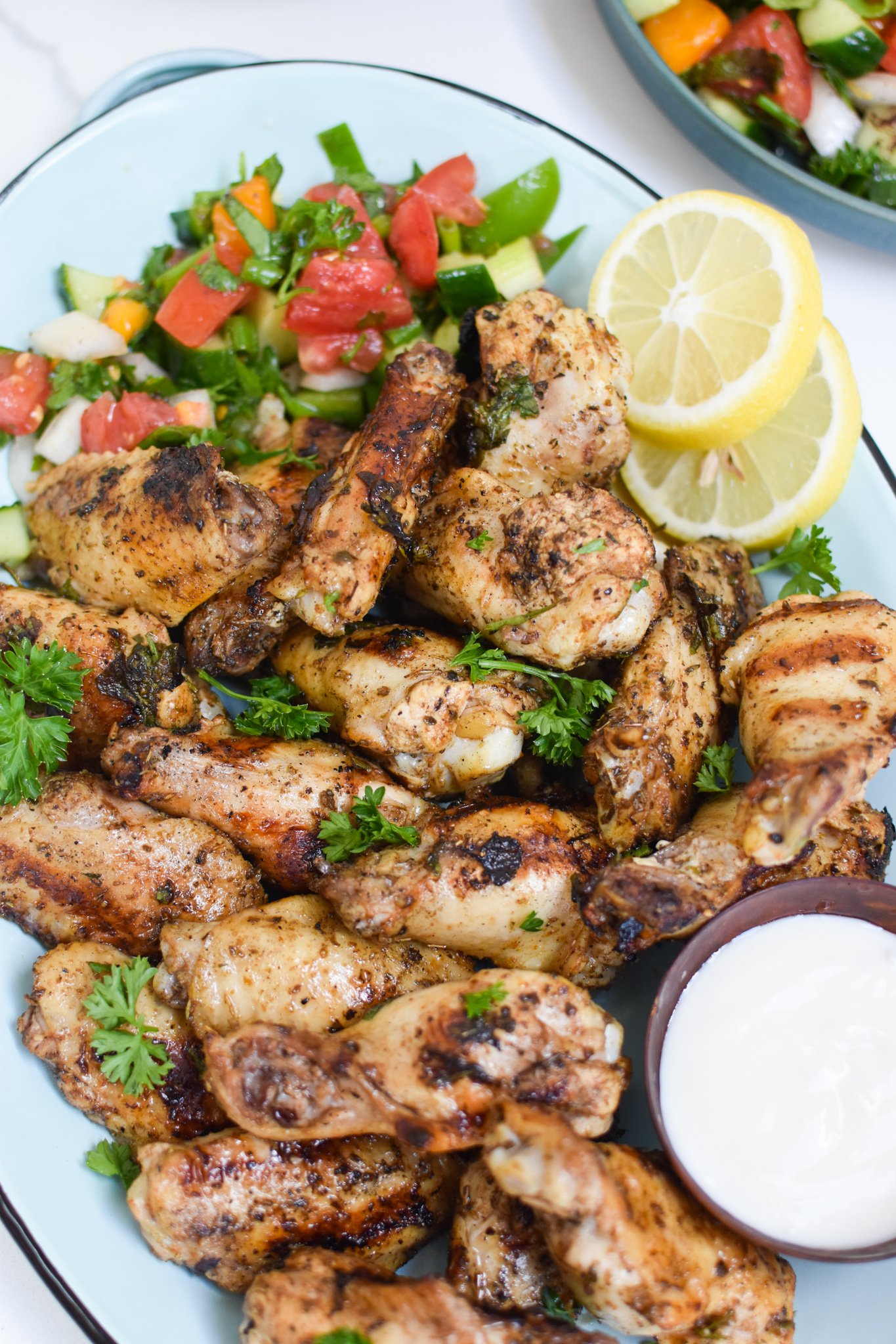 Grilled Mediterranean Chicken Wings with yogurt sauce. 
