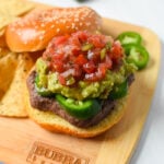 Tex Mex Burger on cutting board.