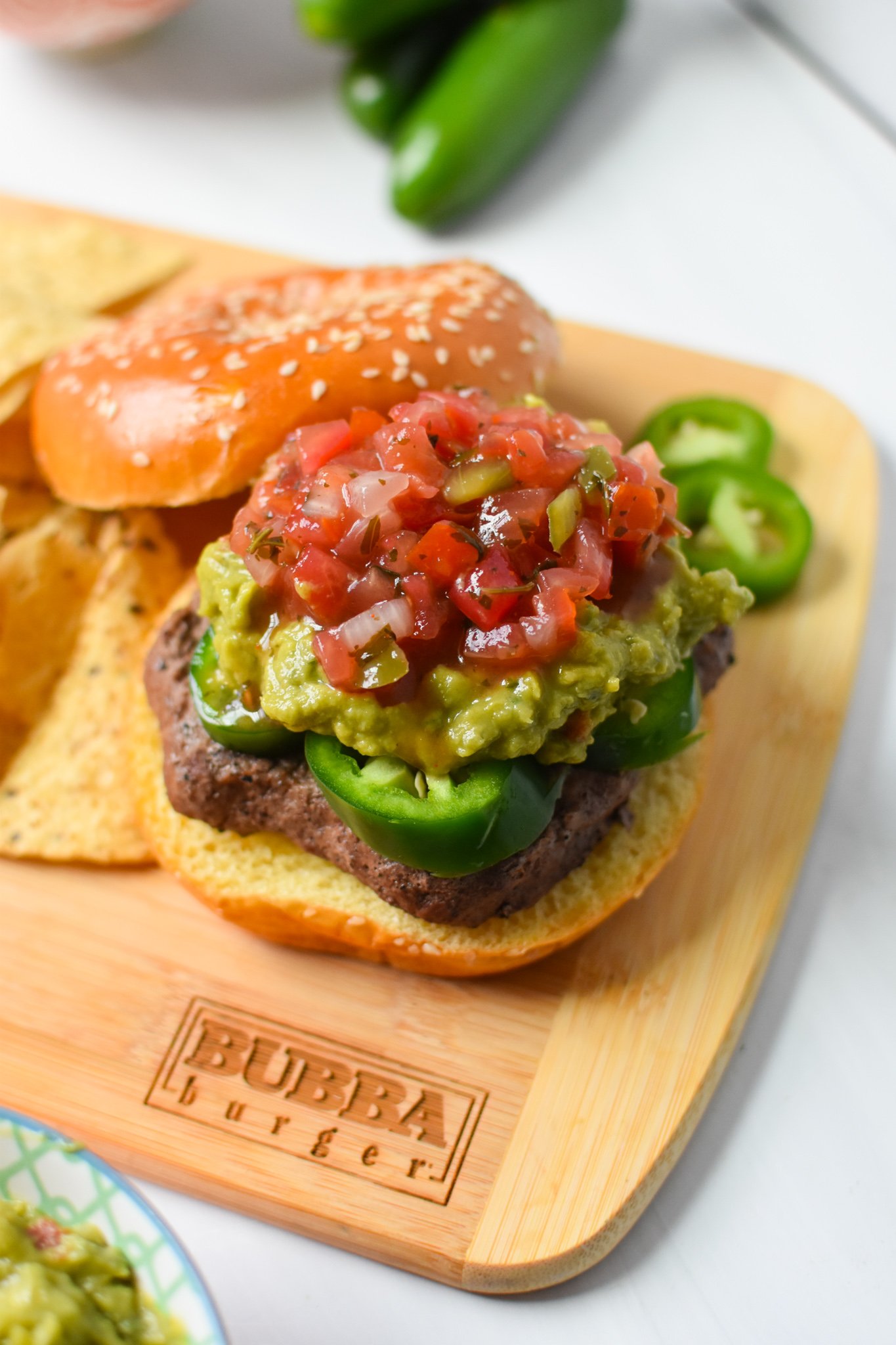 Tex Mex Burger on cutting board. 