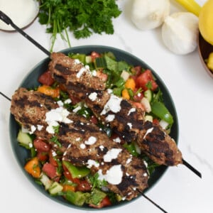 Turkey Kofta Kebab Recipe on a salad.