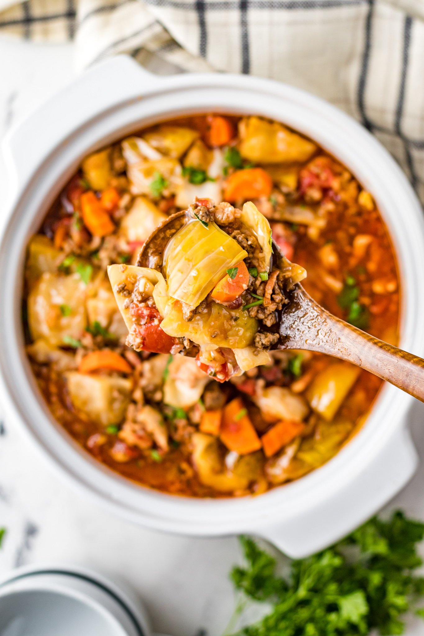 Cabbage Roll Soup with spoon. 