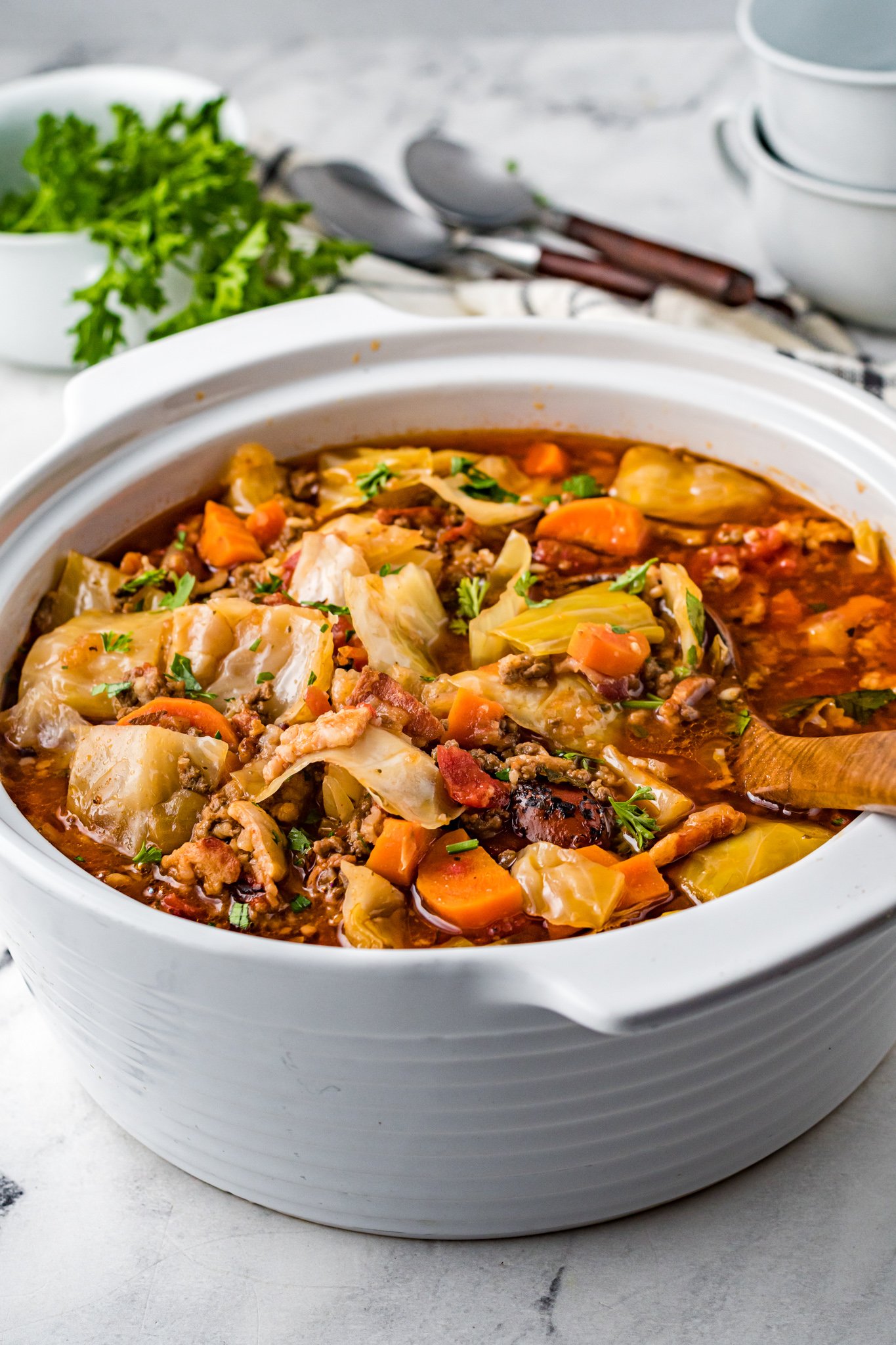 Cabbage Roll Soup with spoon. 