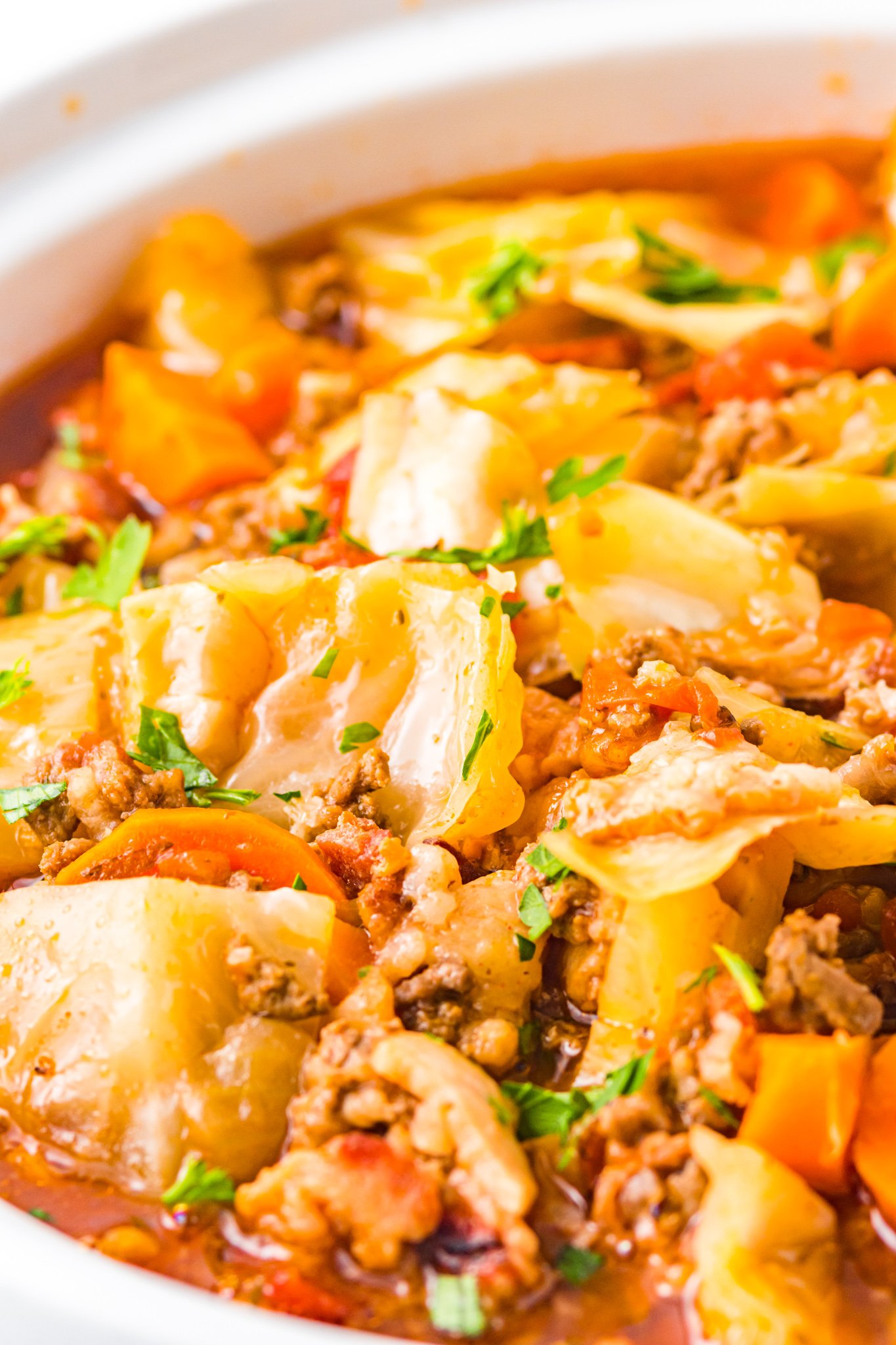 Cabbage Roll Soup in a bowl with the cabbage. 