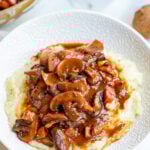 Mushroom Bourguignon on white plate.