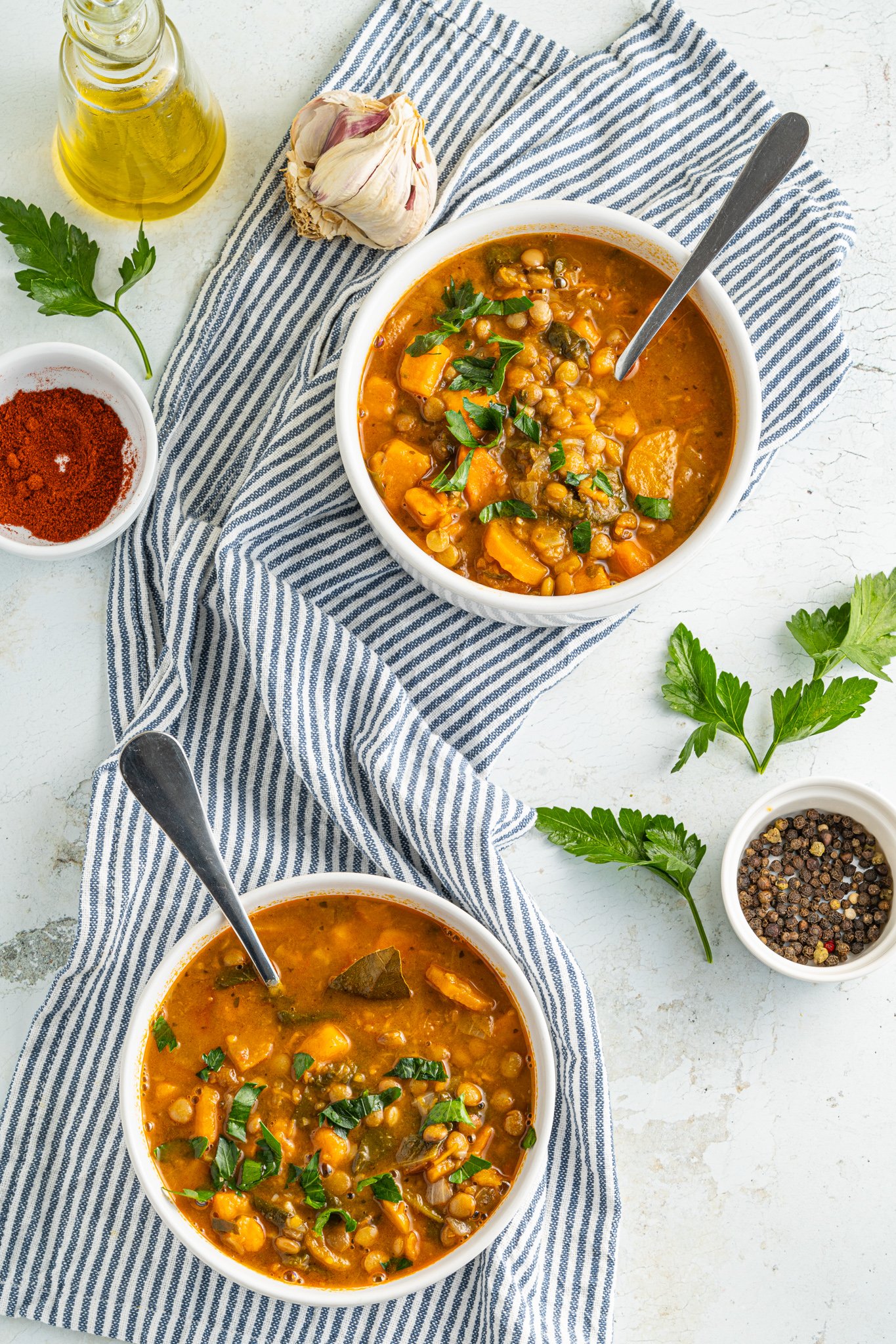 Lentil Sweet Potato Stew Recipe soups with spoons in a bowl. 
