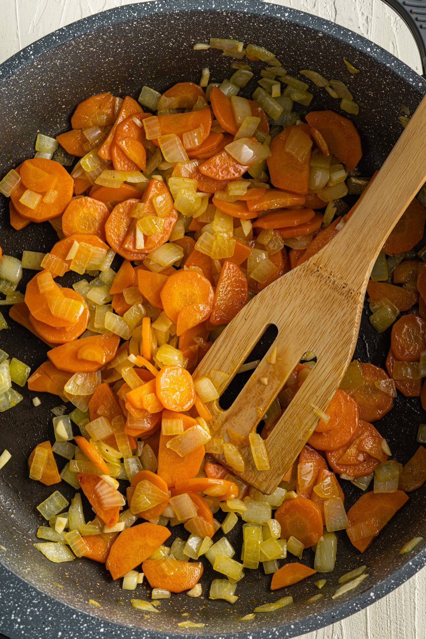Lentil Sweet Potato Stew Recipe with a spatula. 