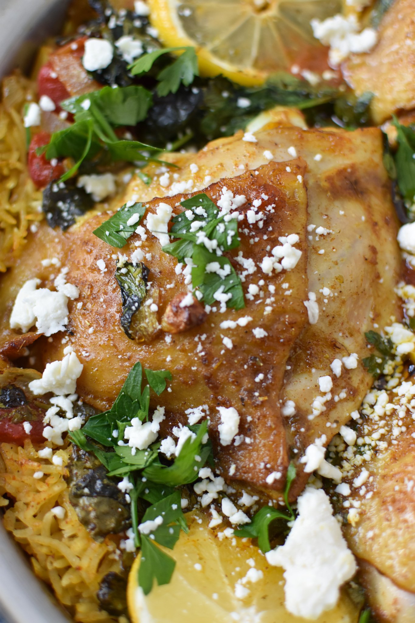 One Pot Mediterranean Chicken and Rice with parsley. 