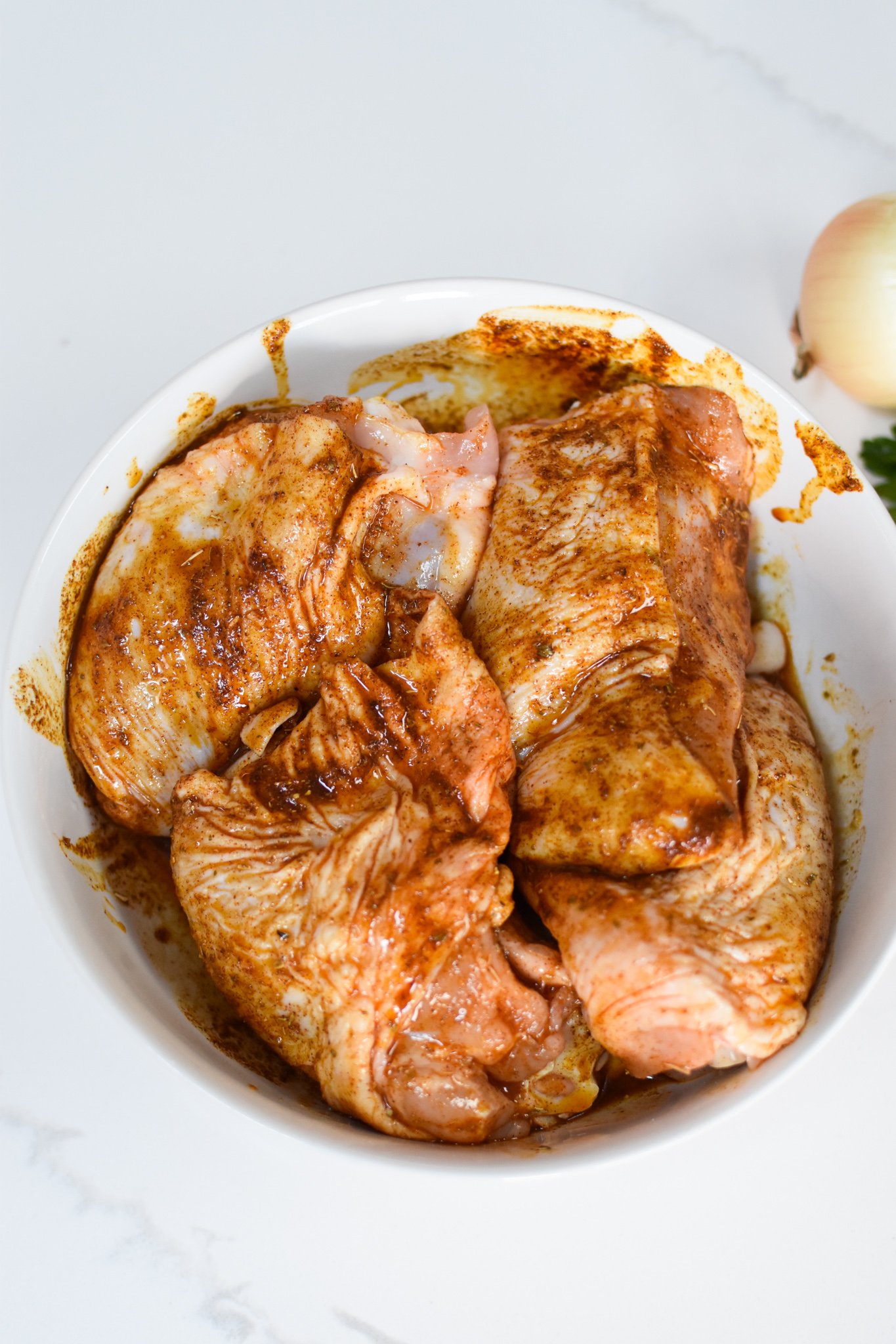 One Pot Mediterranean Chicken and Rice in a bowl.