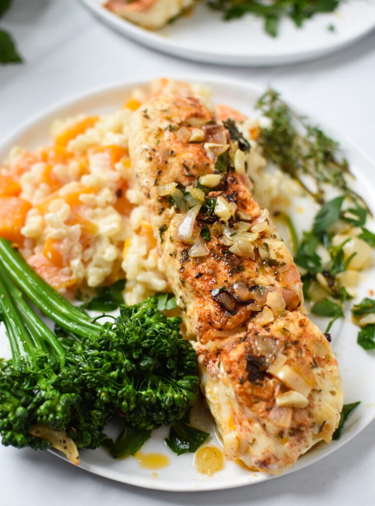 Lemon Garlic Halibut Recipe with broccoli on plate.