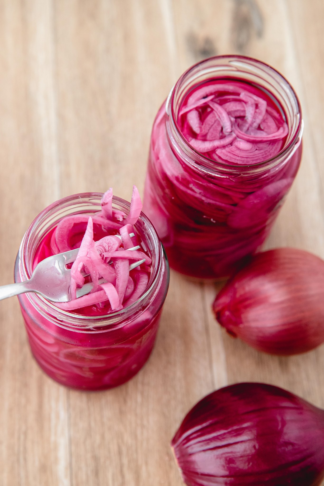 Quick Pickled Red Onions with fork.