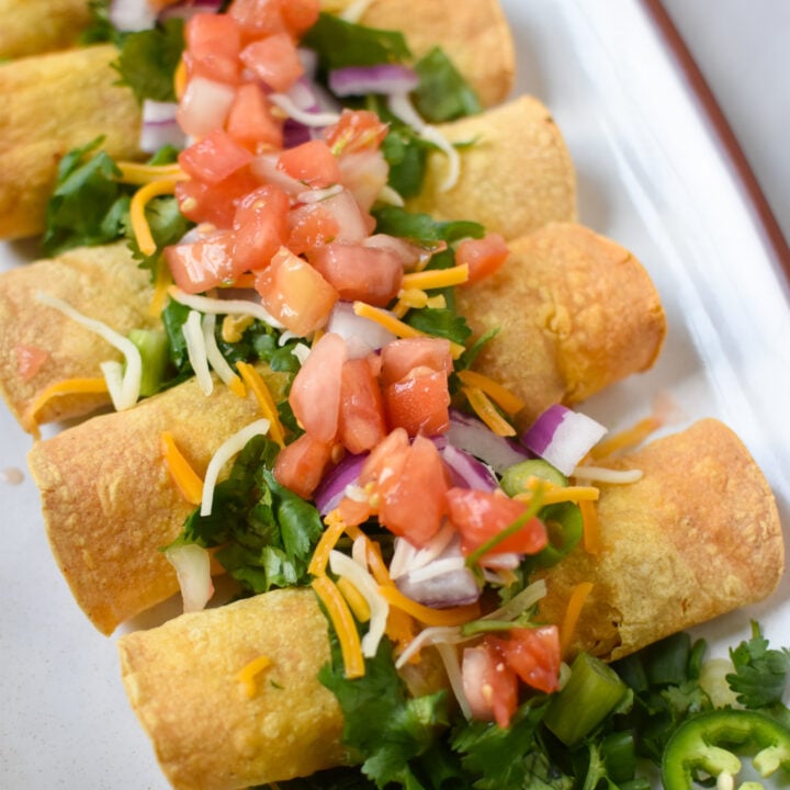 Air Fryer Pork Taquitos with pico de gallo.