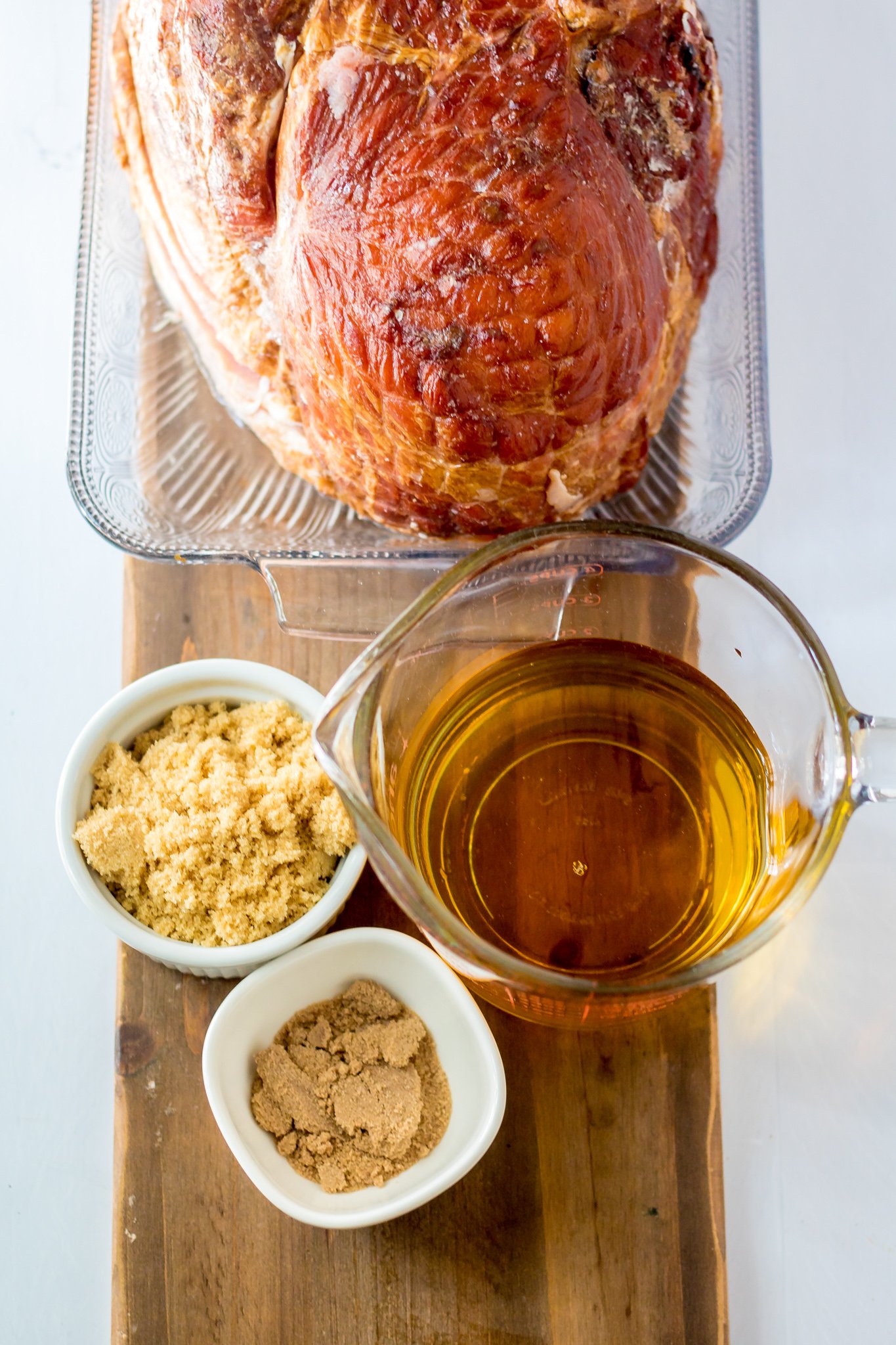 Apple Cider Glazed Ham Recipe ingredients on cutting board.