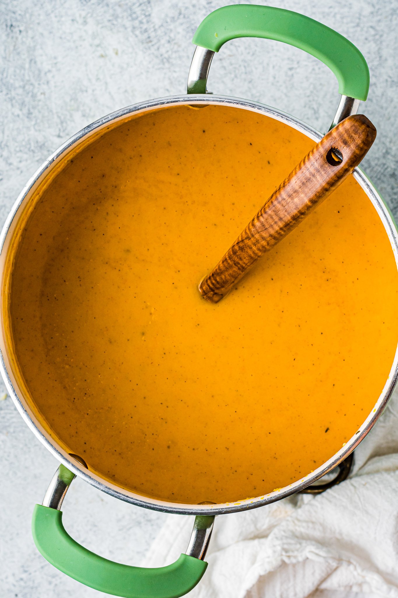 Butternut Squash and Sweet Potato Soup pureed in a pot.