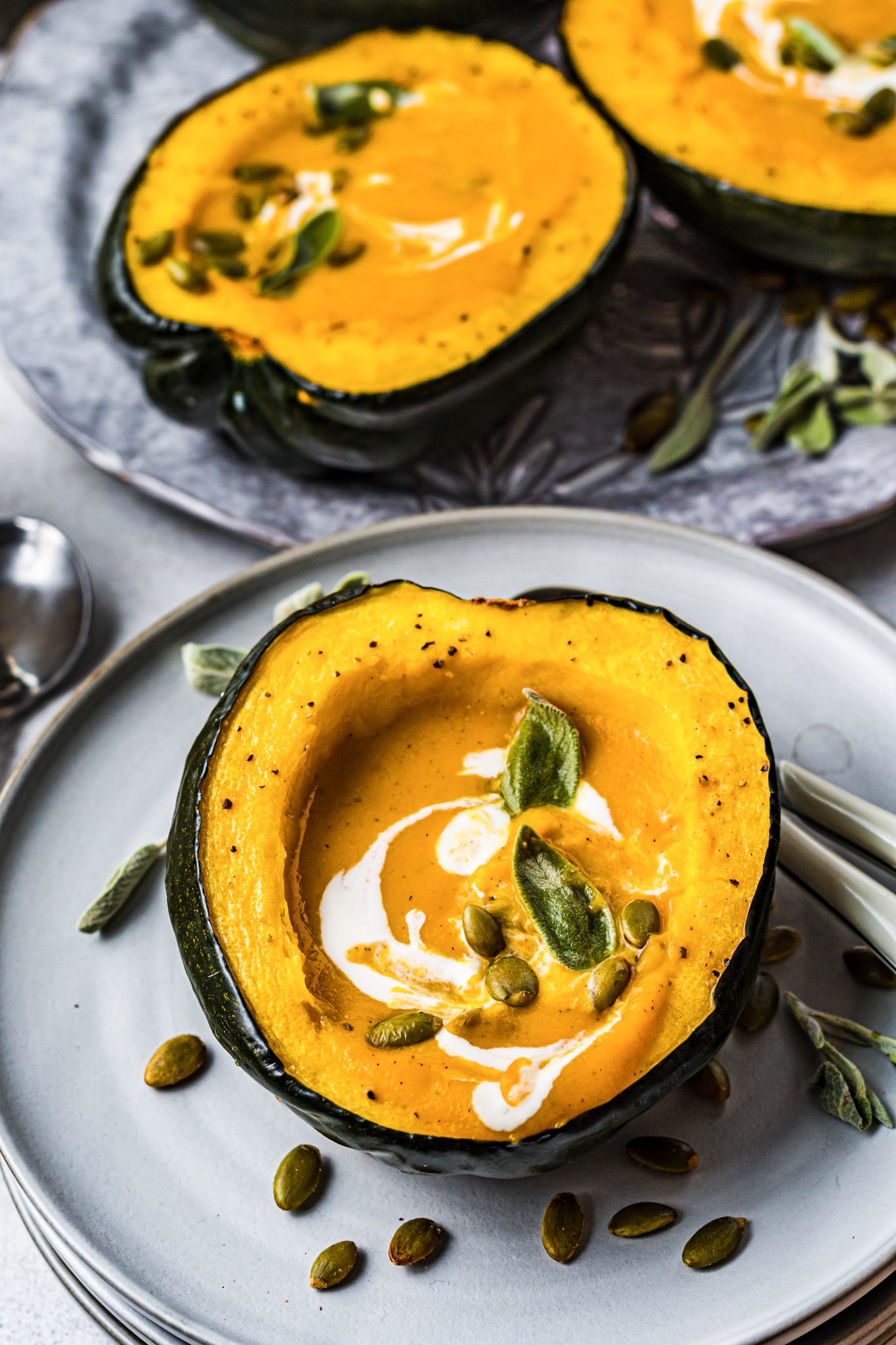 Butternut Squash and Sweet Potato Soup in an acorn squash bowl. 
