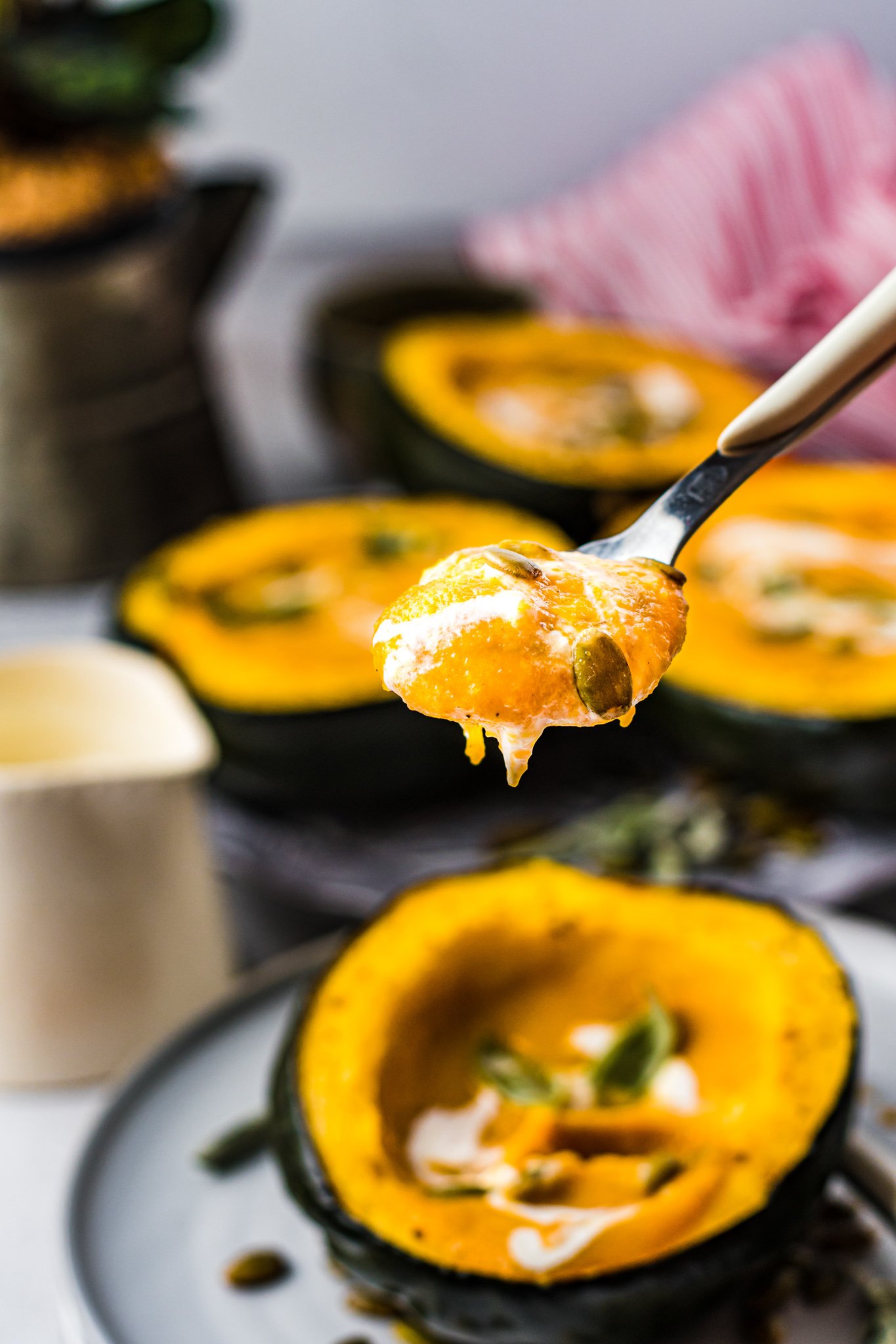 Butternut Squash and Sweet Potato Soup with spoon.