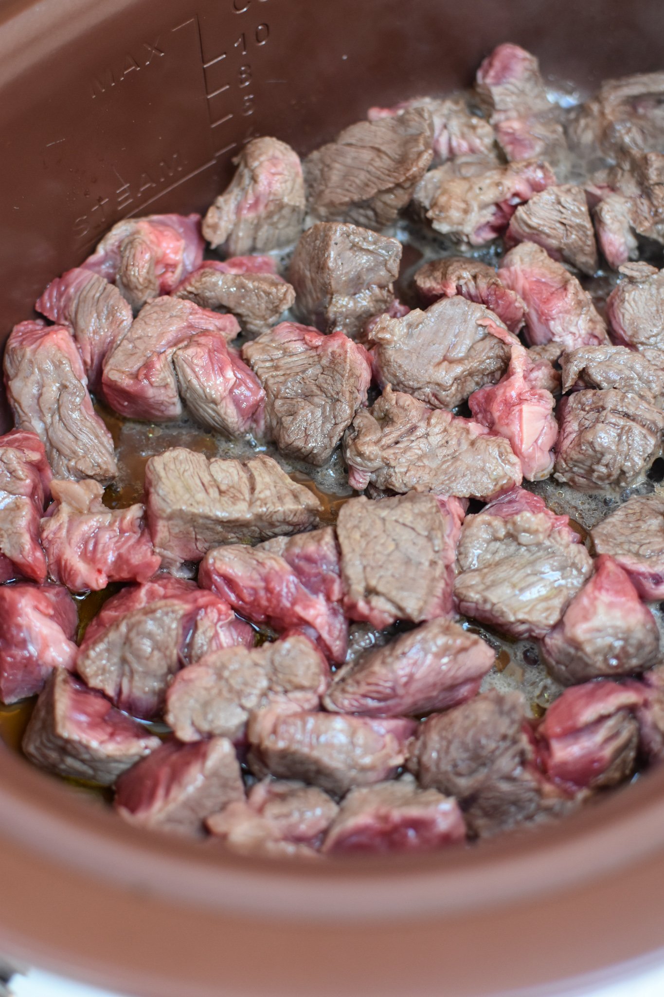 Slow Cooker Beef Curry beef in a slow cooker.