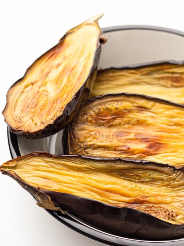 Air Fryer Eggplant in the air fryer cooking.