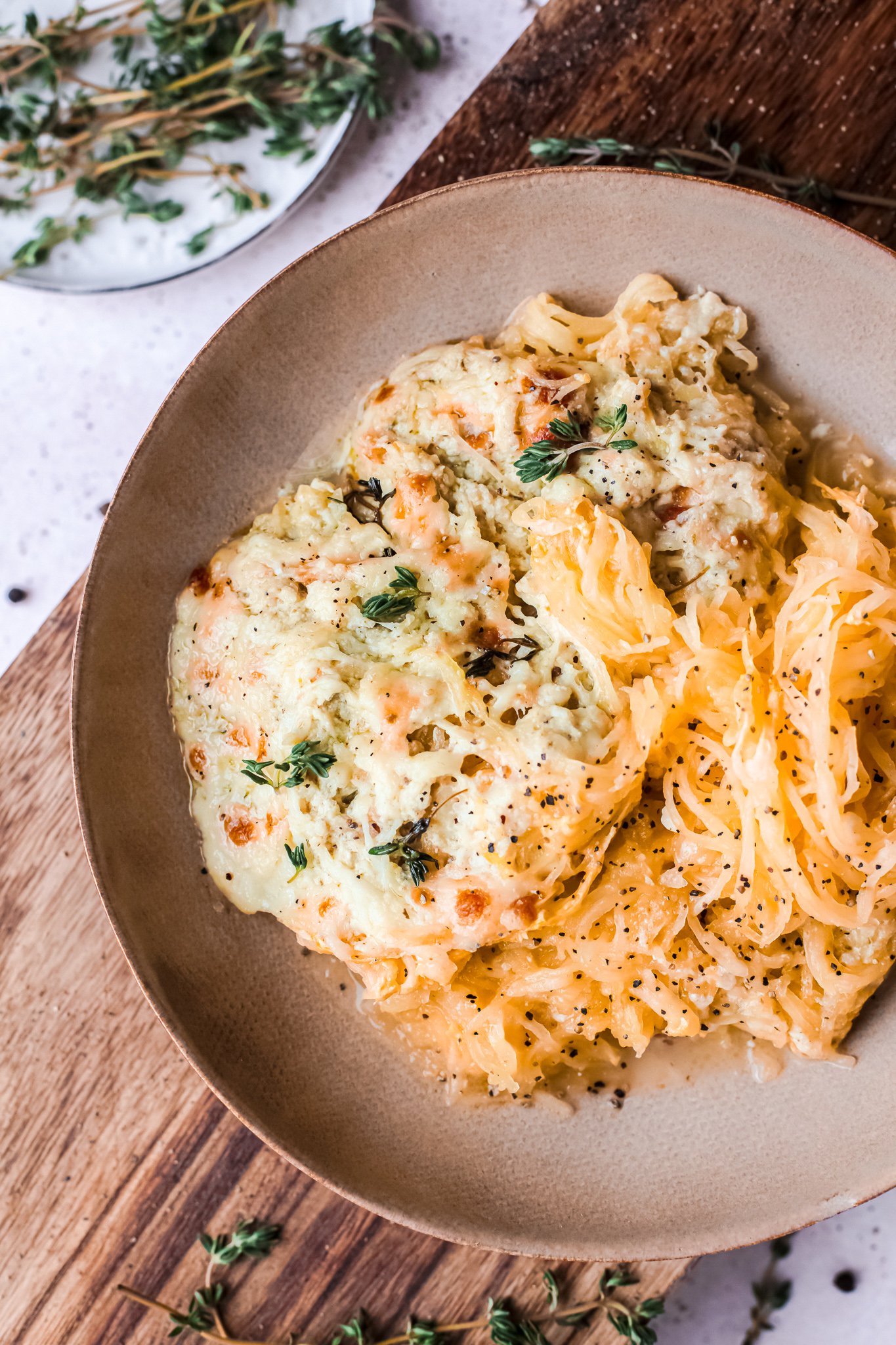  Baked Cheesy Spaghetti Squash Recipe with cheese and fresh herbs. 