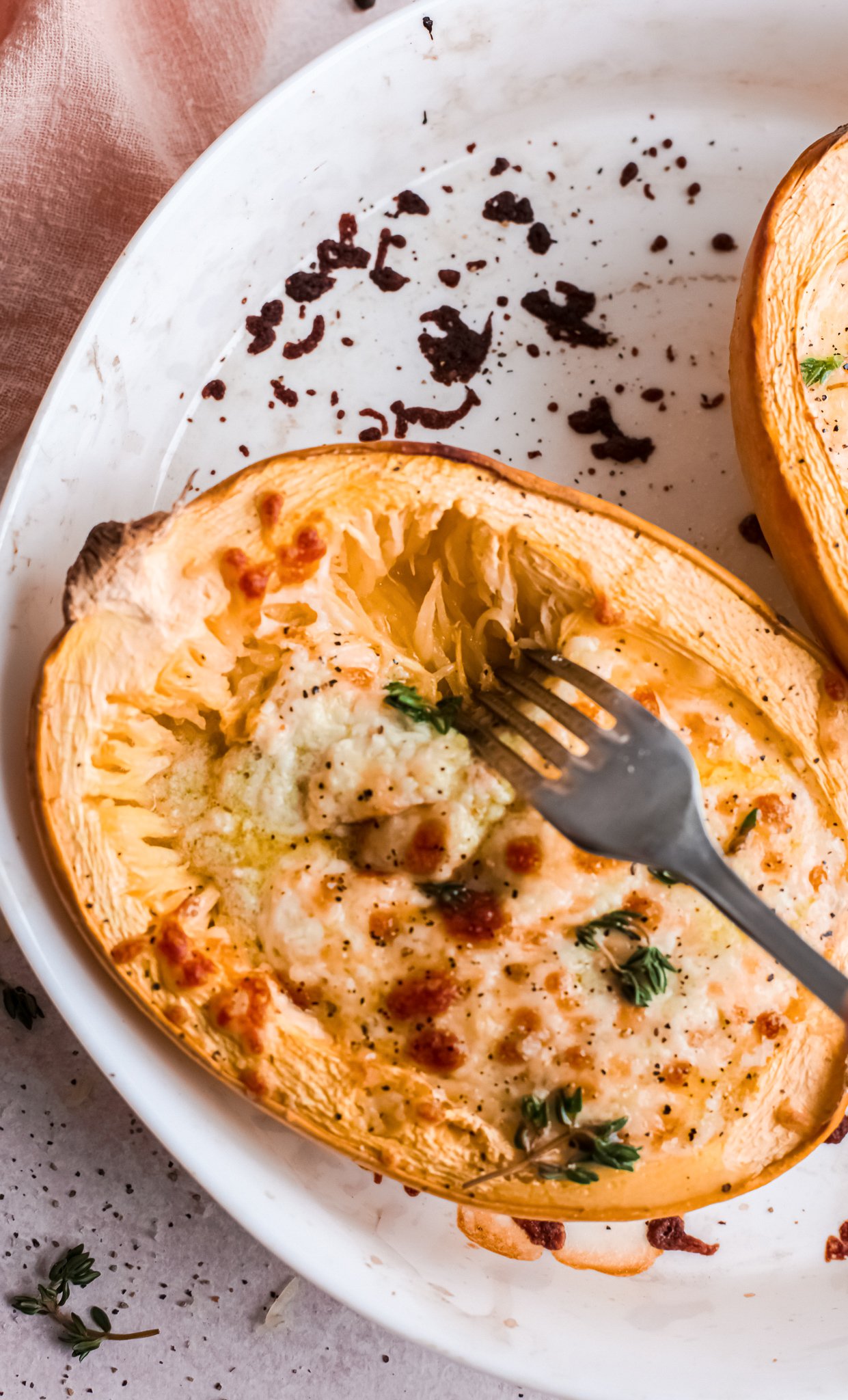 Baked Cheesy Spaghetti Squash Recipe in squash bowl. 