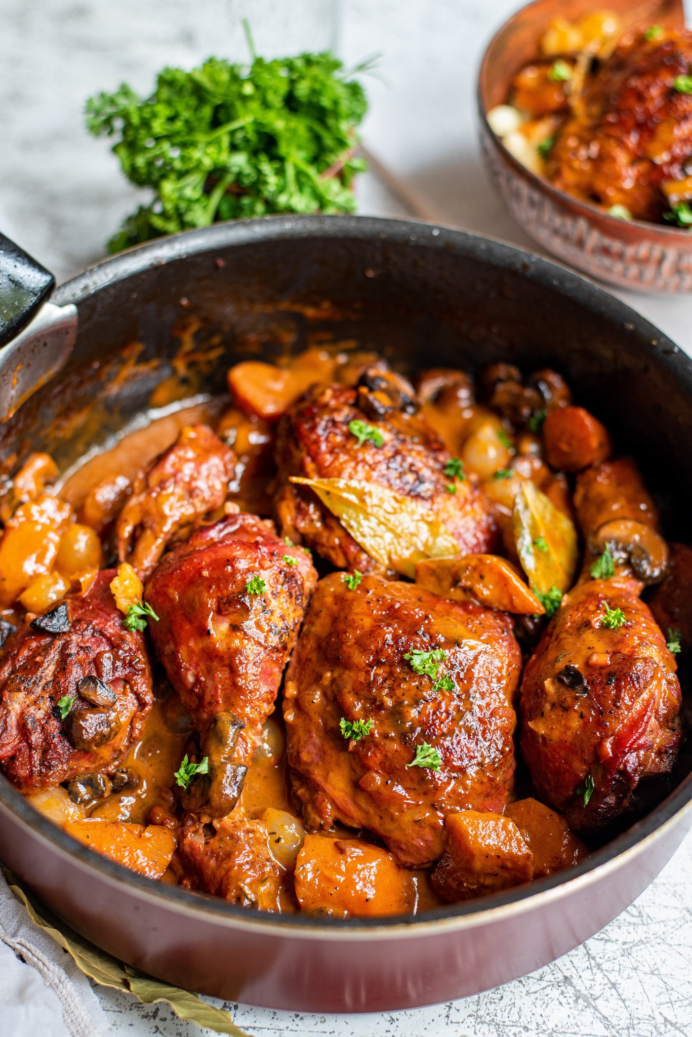 Coq au Vin Recipe in a large dutch oven.