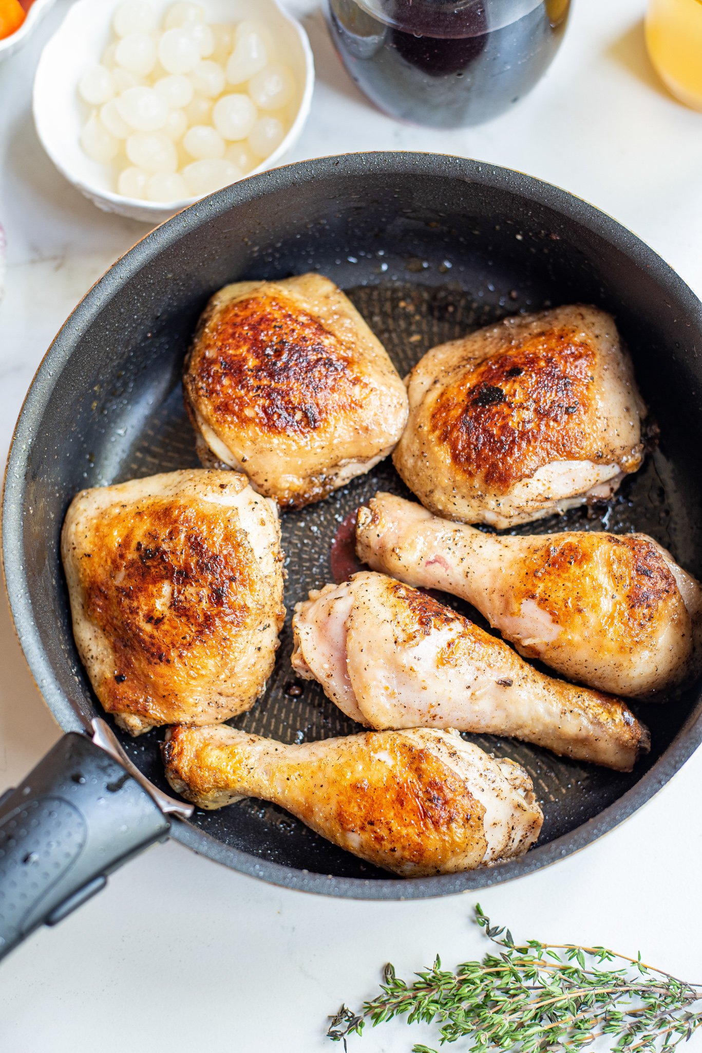 Coq au Vin Recipe browning the chicken. 