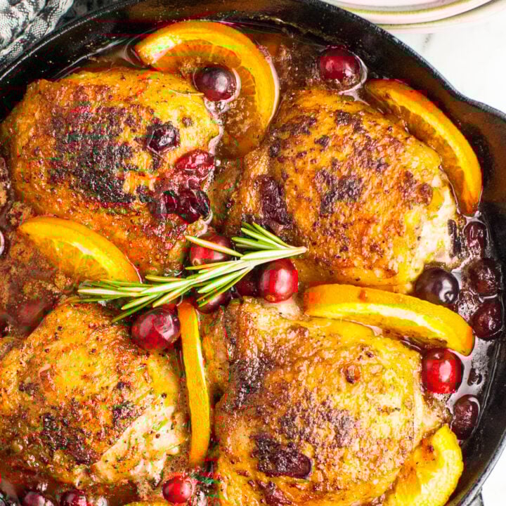 Easy Baked Chicken Thighs in a cast iron skillet.