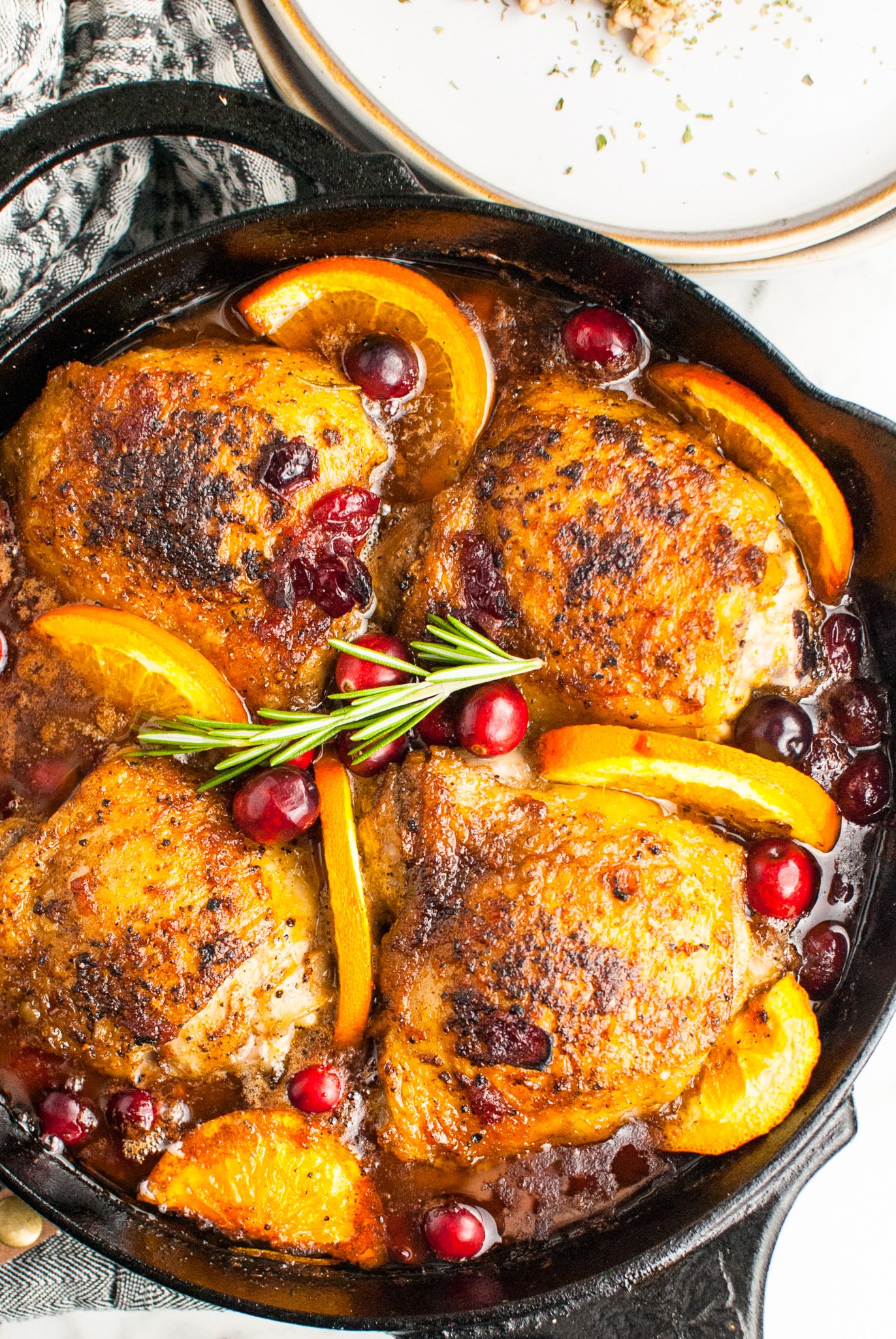 Easy Baked Chicken Thighs in a cast iron skillet.