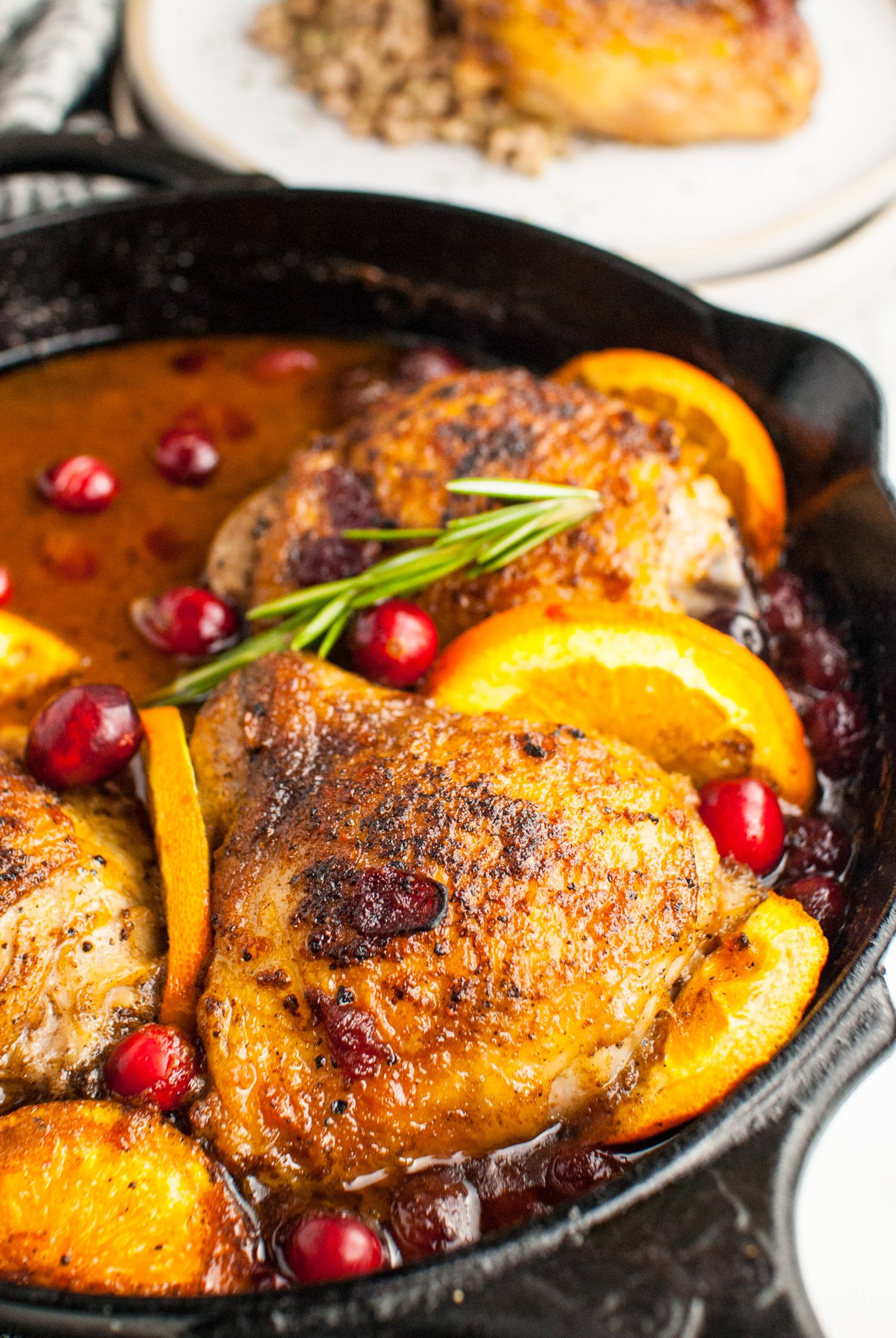 Easy Baked Chicken Thighs in a cast iron skillet.