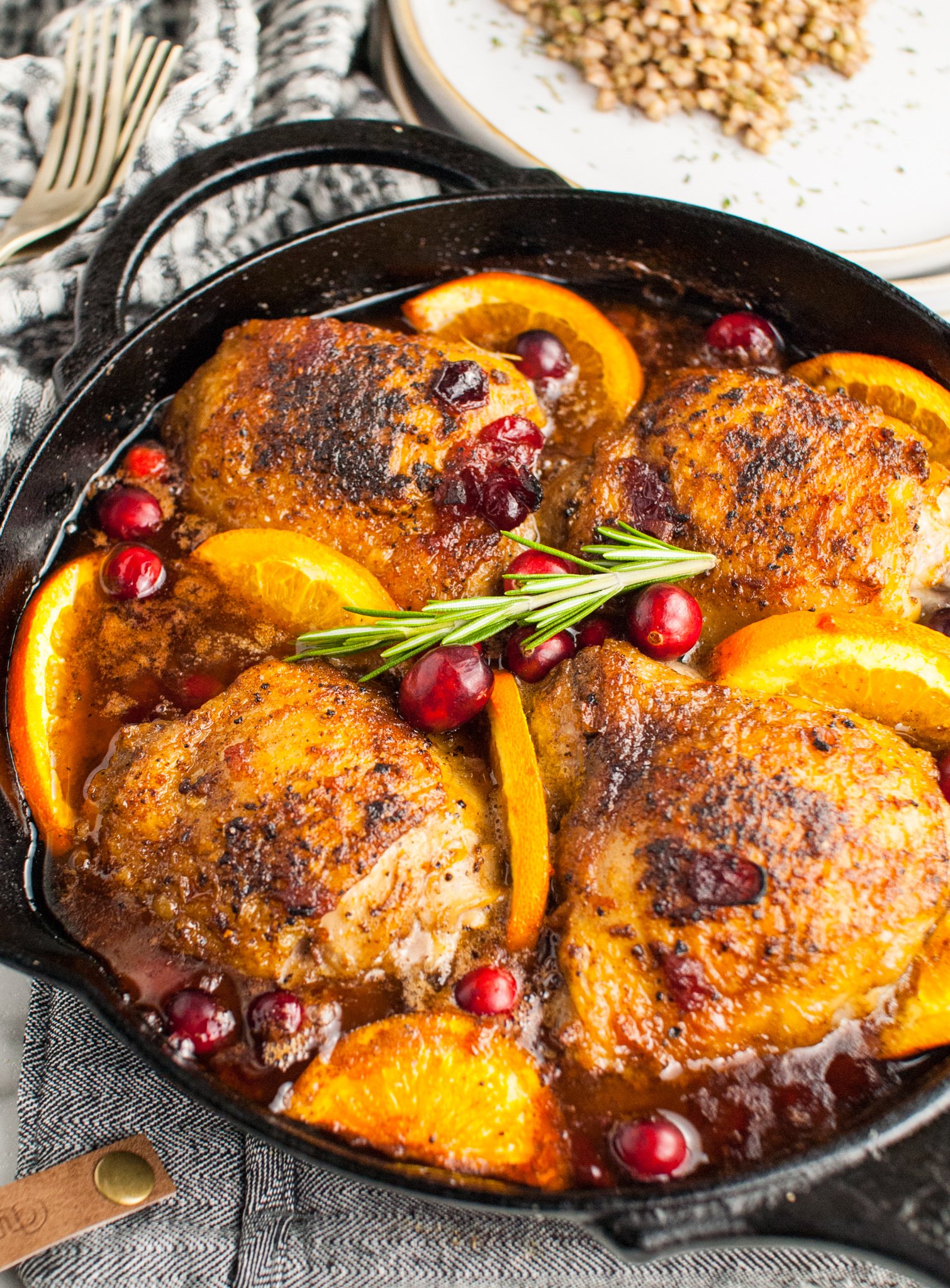 Easy Baked Chicken Thighs with cast iron skillet.