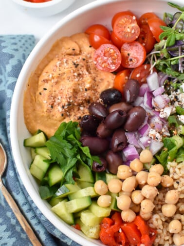 Easy Mediterranean Hummus Bowl with tomatoes.