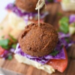 Falafel Sliders with Tahini Slaw with toothpick in the slider.