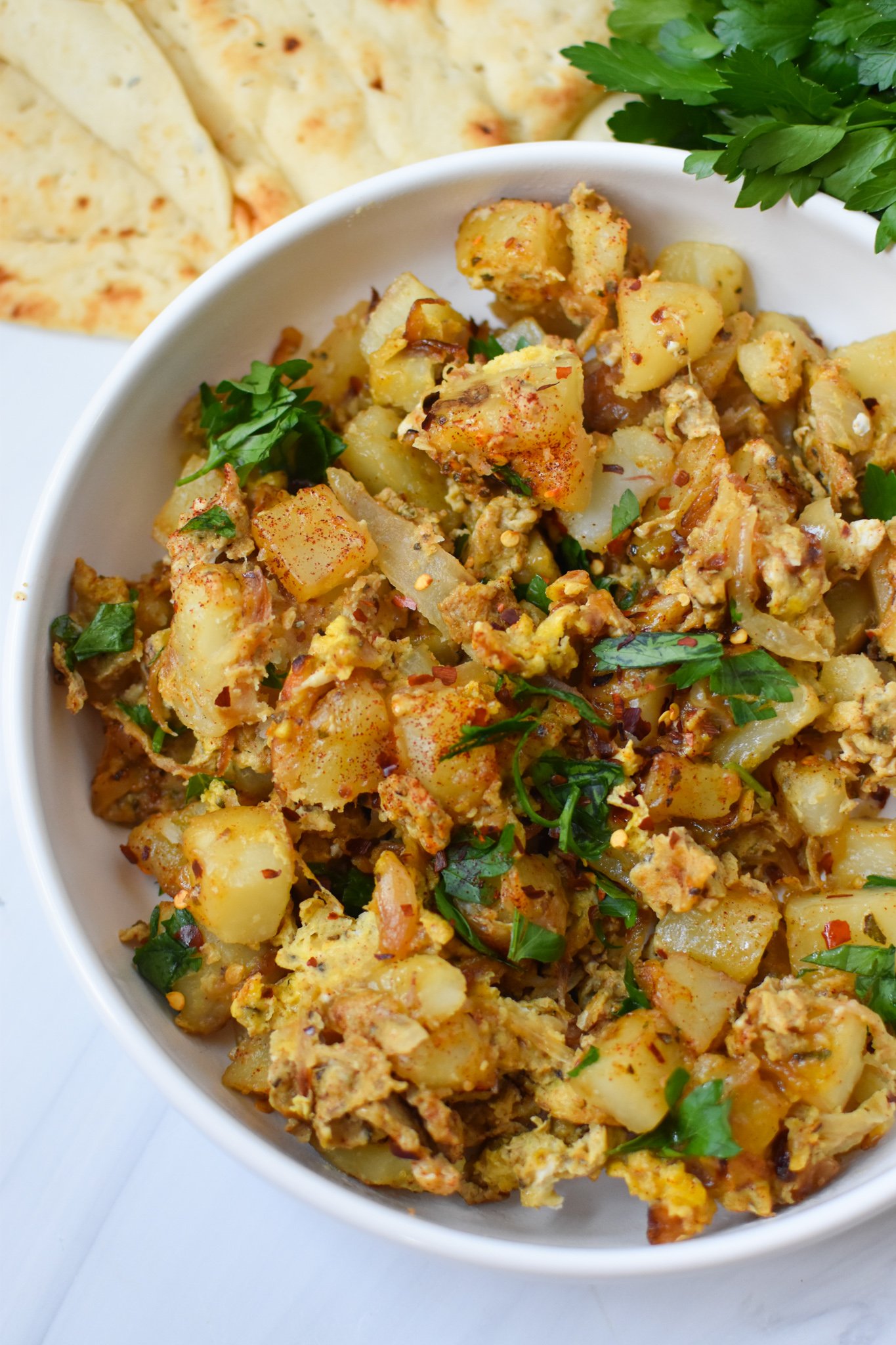 Lebanese Potato and Egg Recipe with parsley.