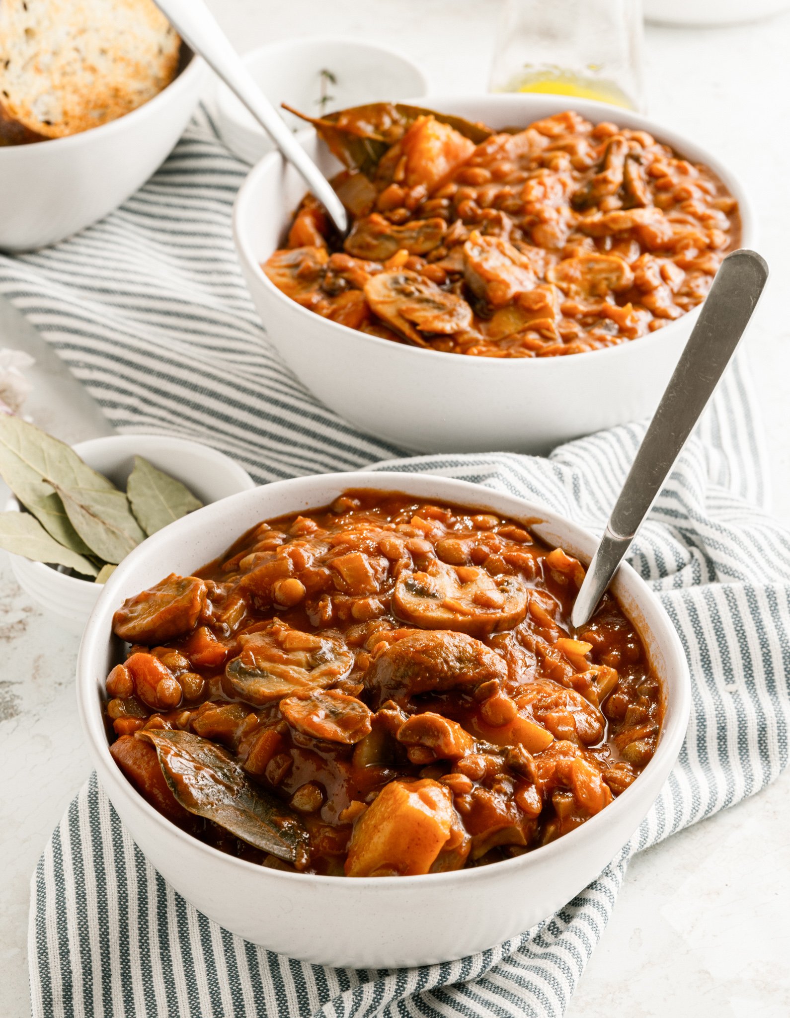 Lentil Mushroom Stew in white bowls.