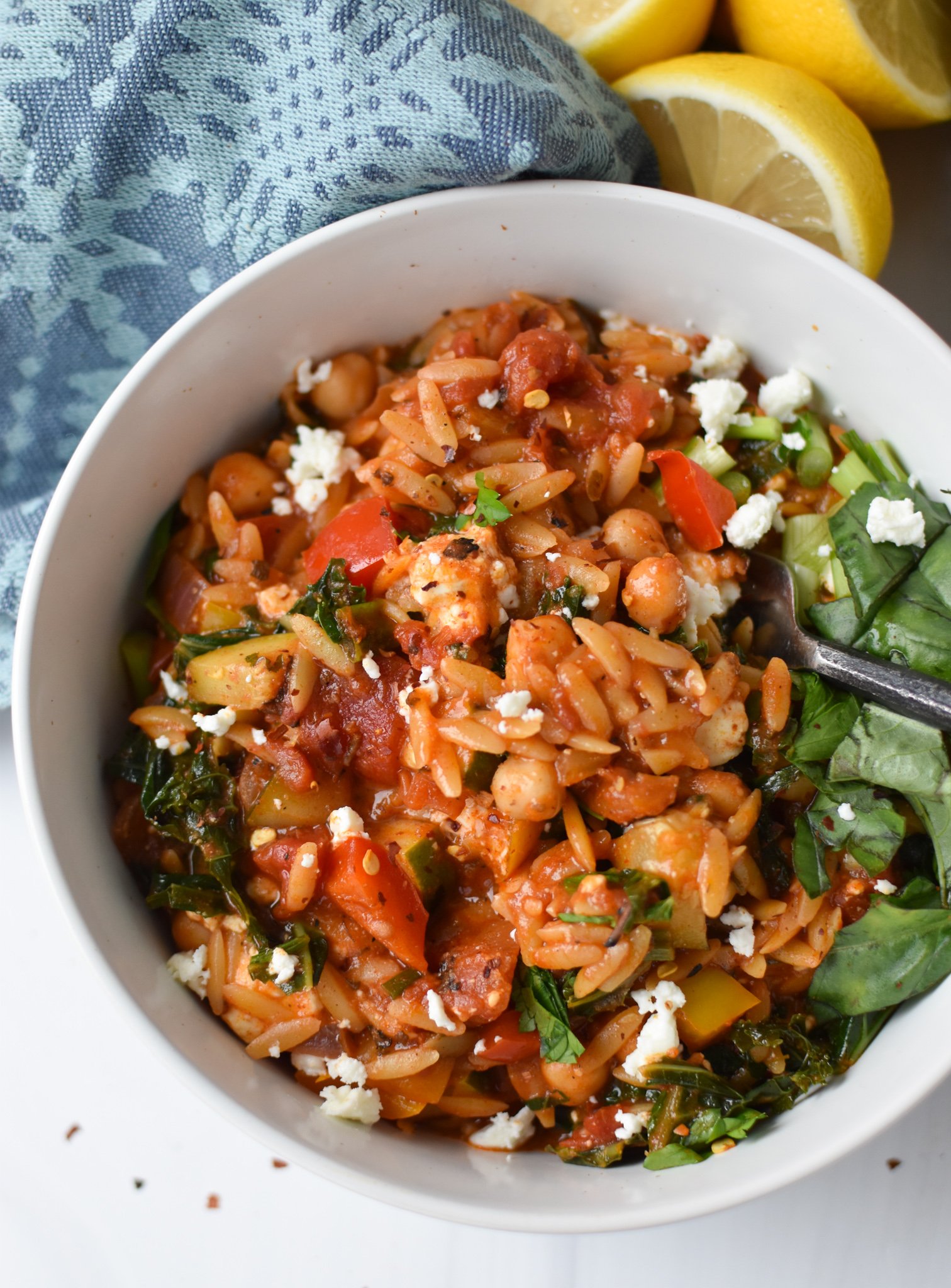 Mediterranean Orzo Pasta Recipe with a spoon. 