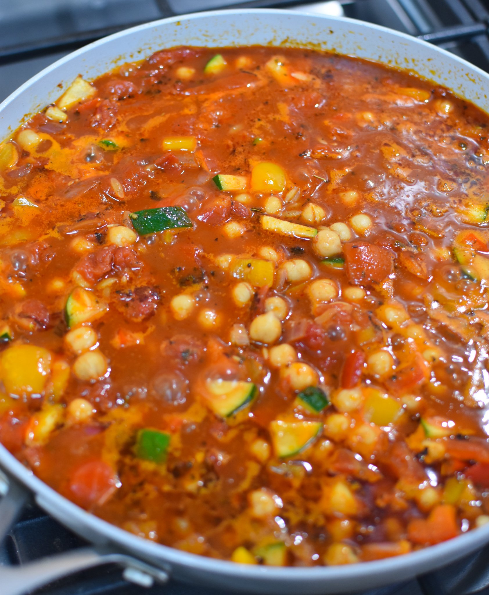 Mediterranean Orzo Pasta Recipe simmering orzo.