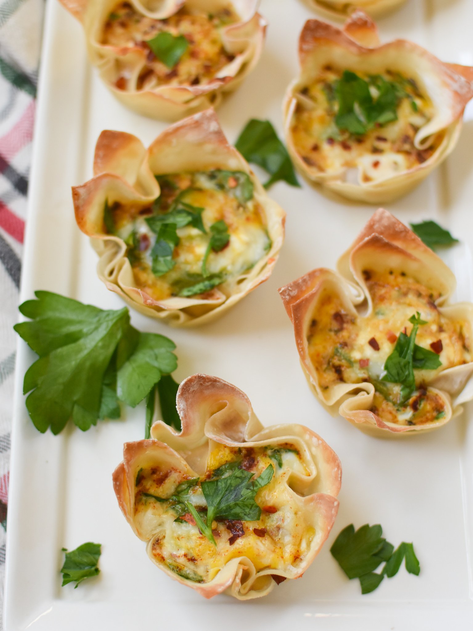 Mediterranean Quiche Wontons on a white plate.