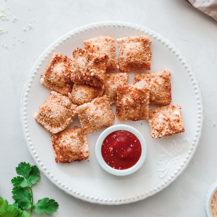 Air Fried Ravioli on a white plate.