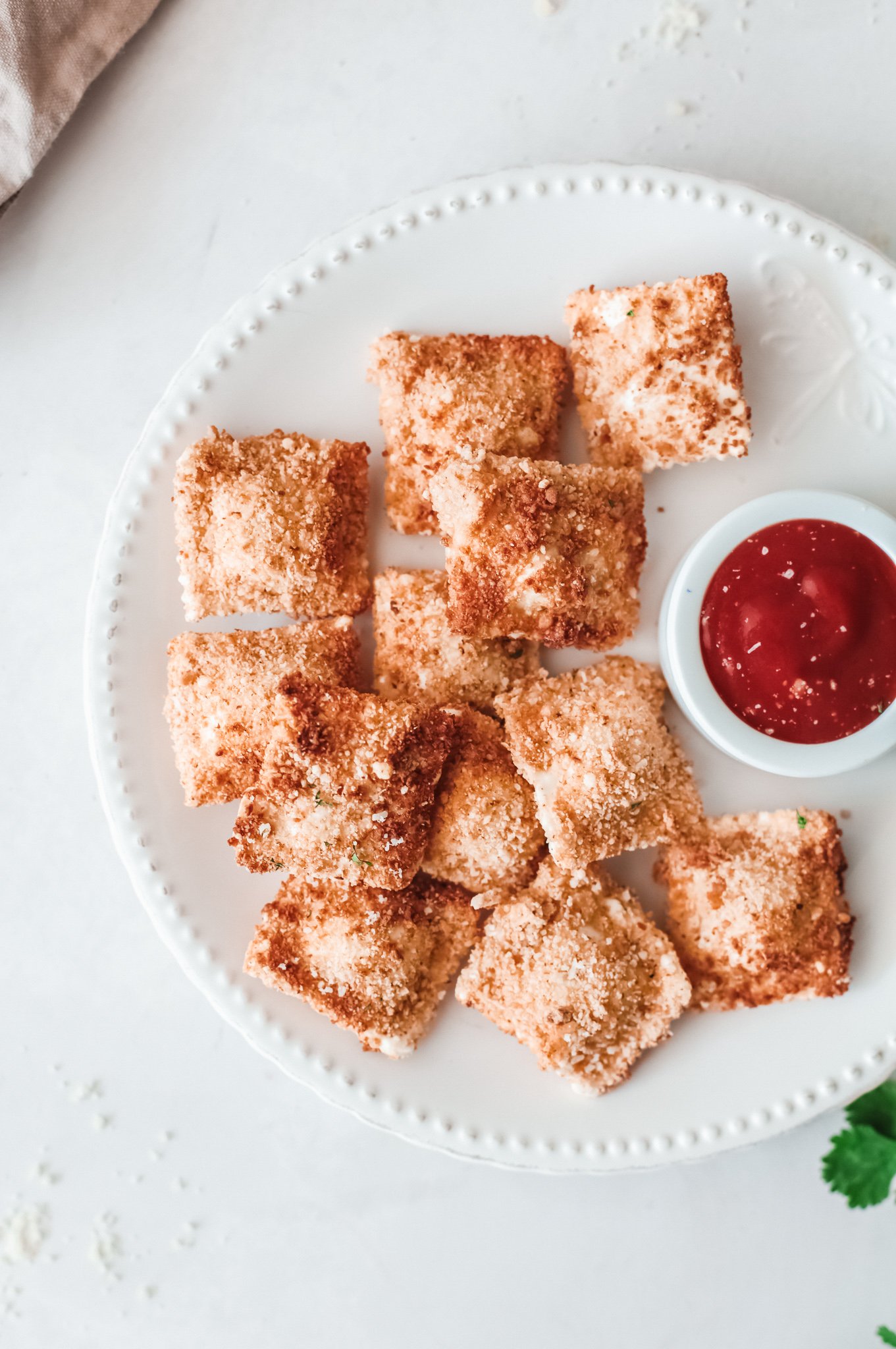 Air Fried Ravioli with sauce.